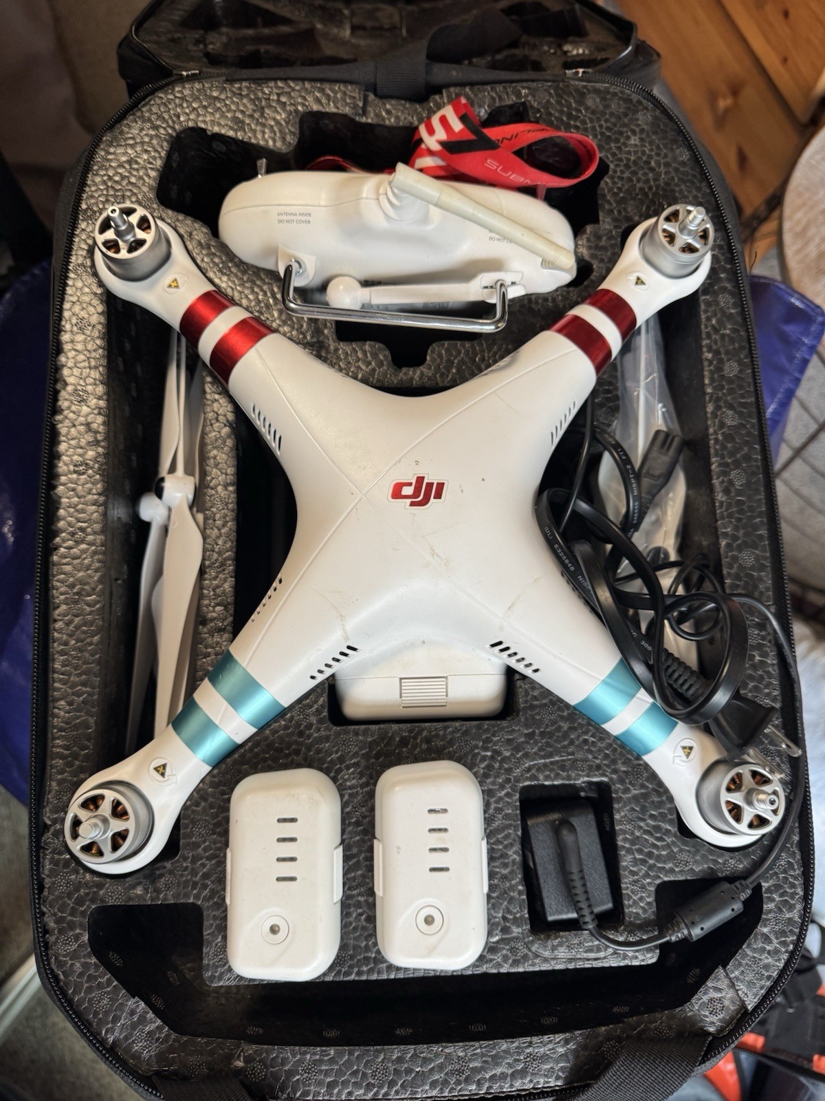 DJI Phantom 3 Standard with 3 batteries, extra propellers, and protective case