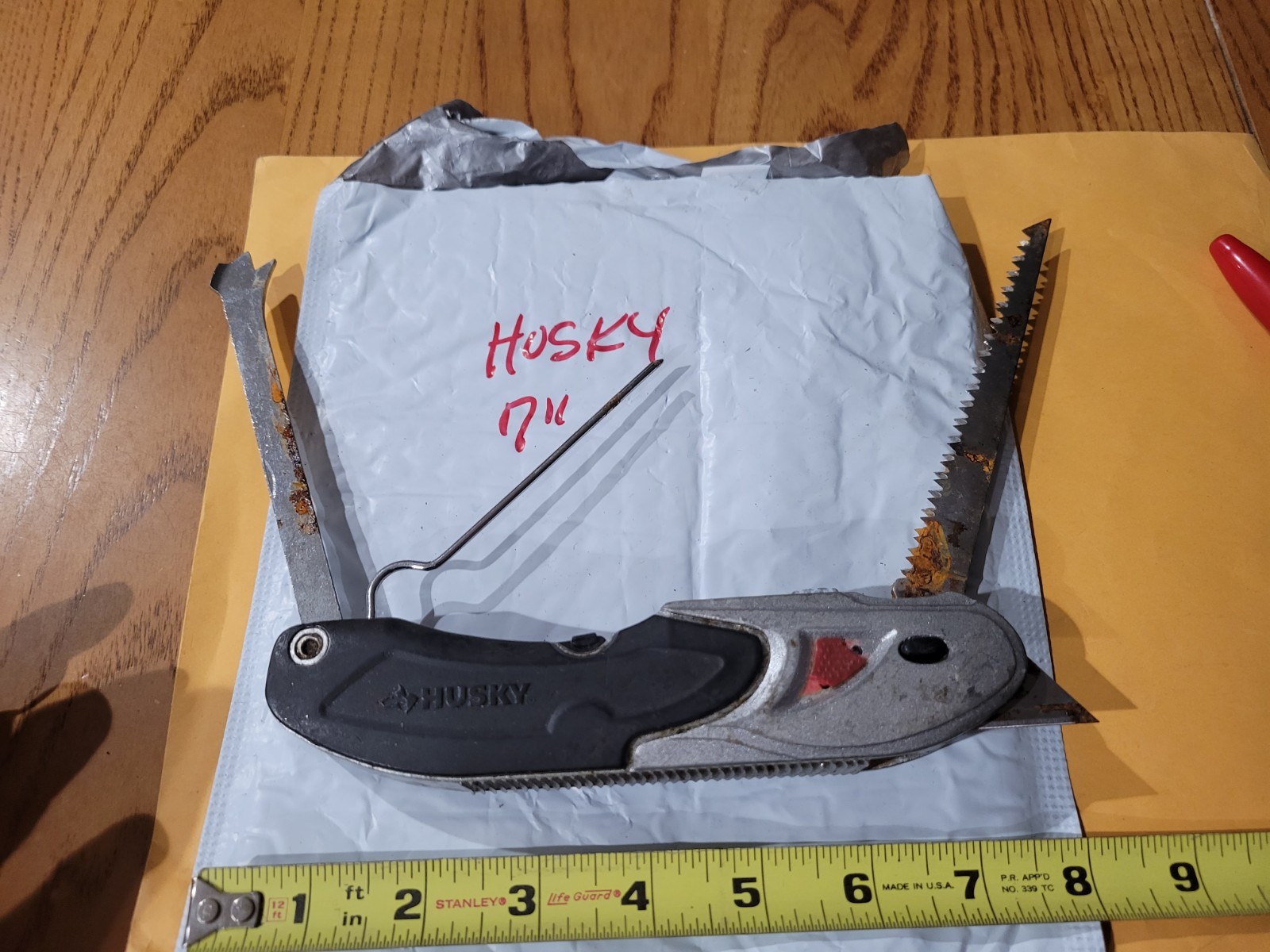 HUSKY 7" MULTI TOOL/KNIFE/ FISHING TOOL GOOD SHAPE