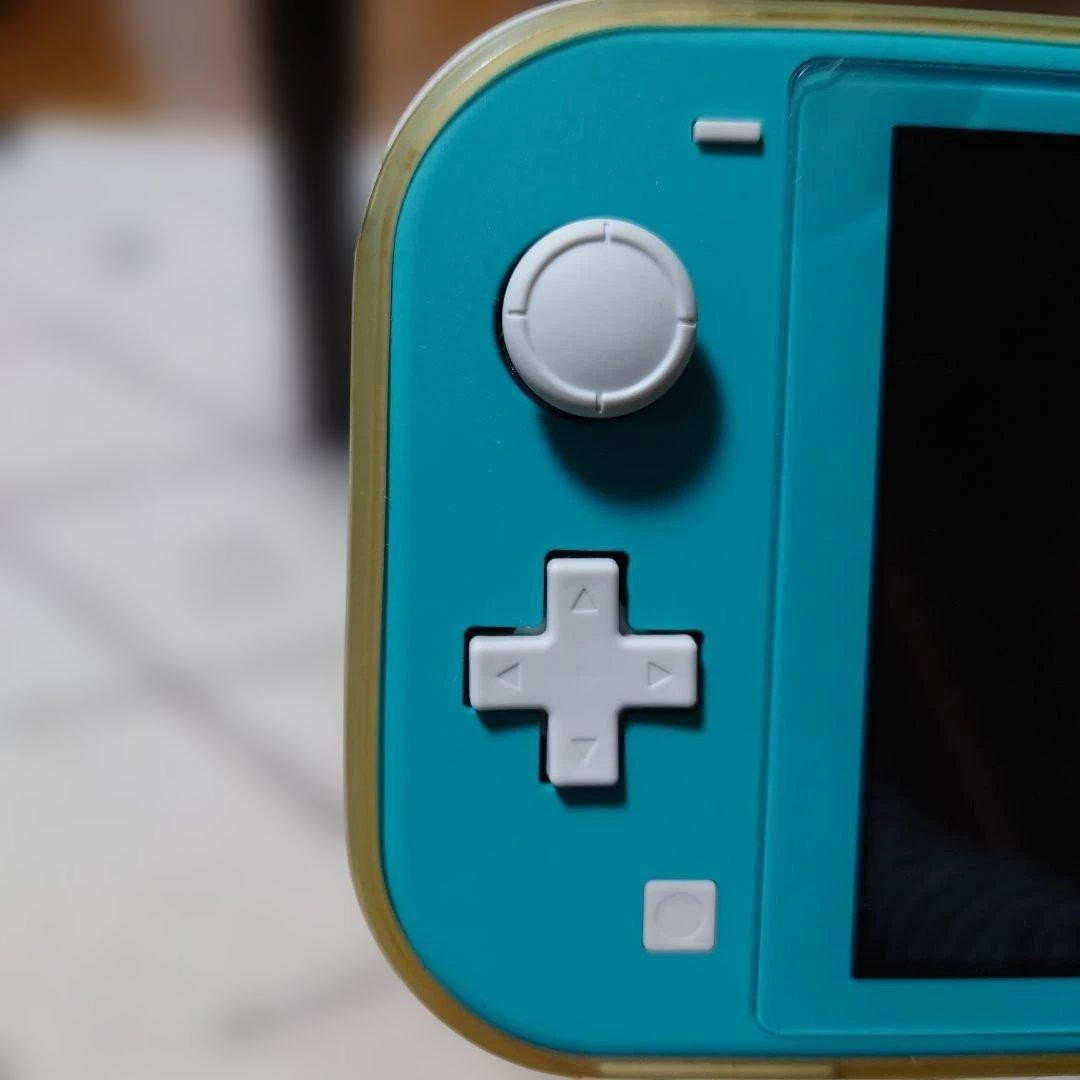Excellent condition Nintendo Switch Lite Turquoise with Charger and Box