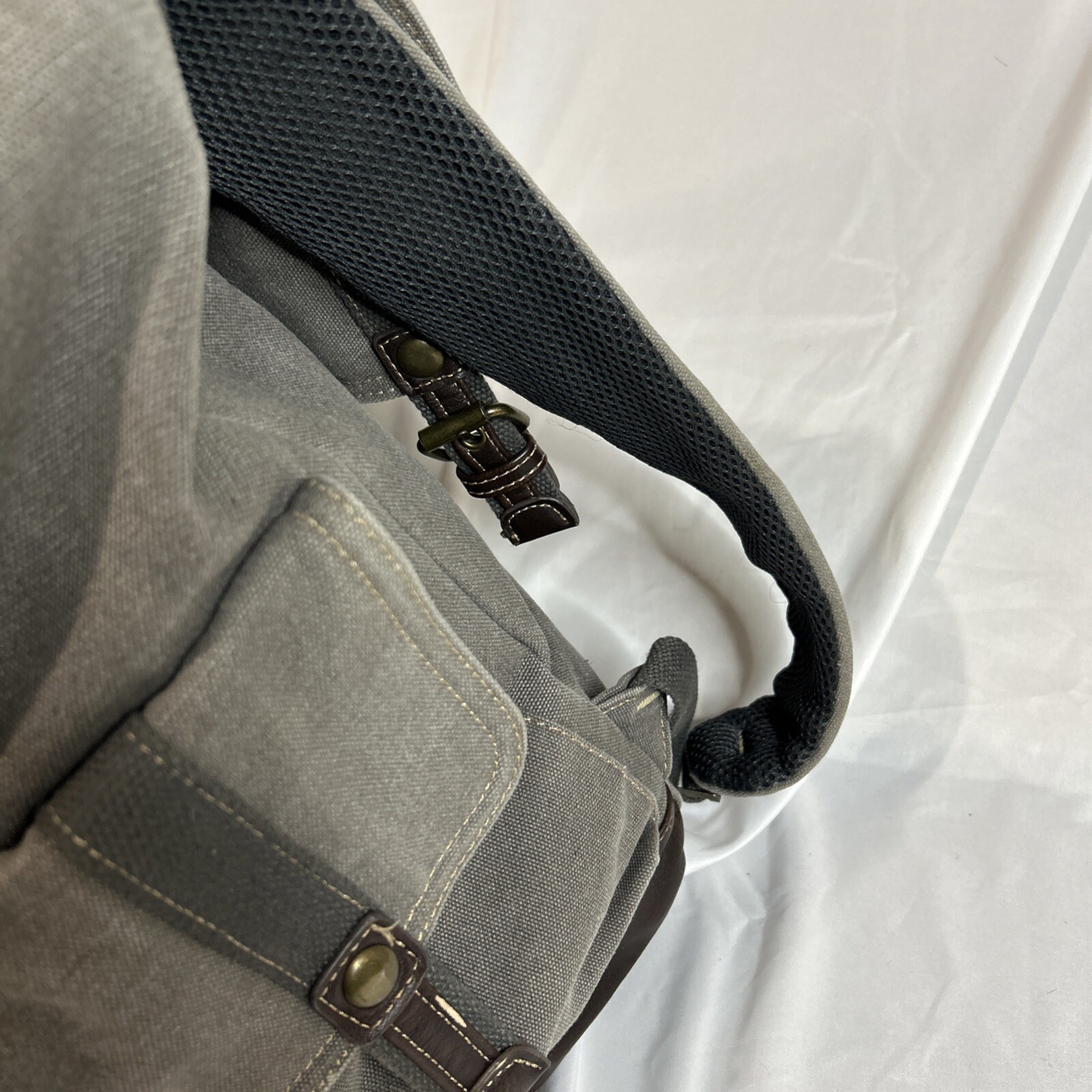 Cargoit Gray Canvas Backpack Magnetic Closures Pockets Straps and A Deep Inside