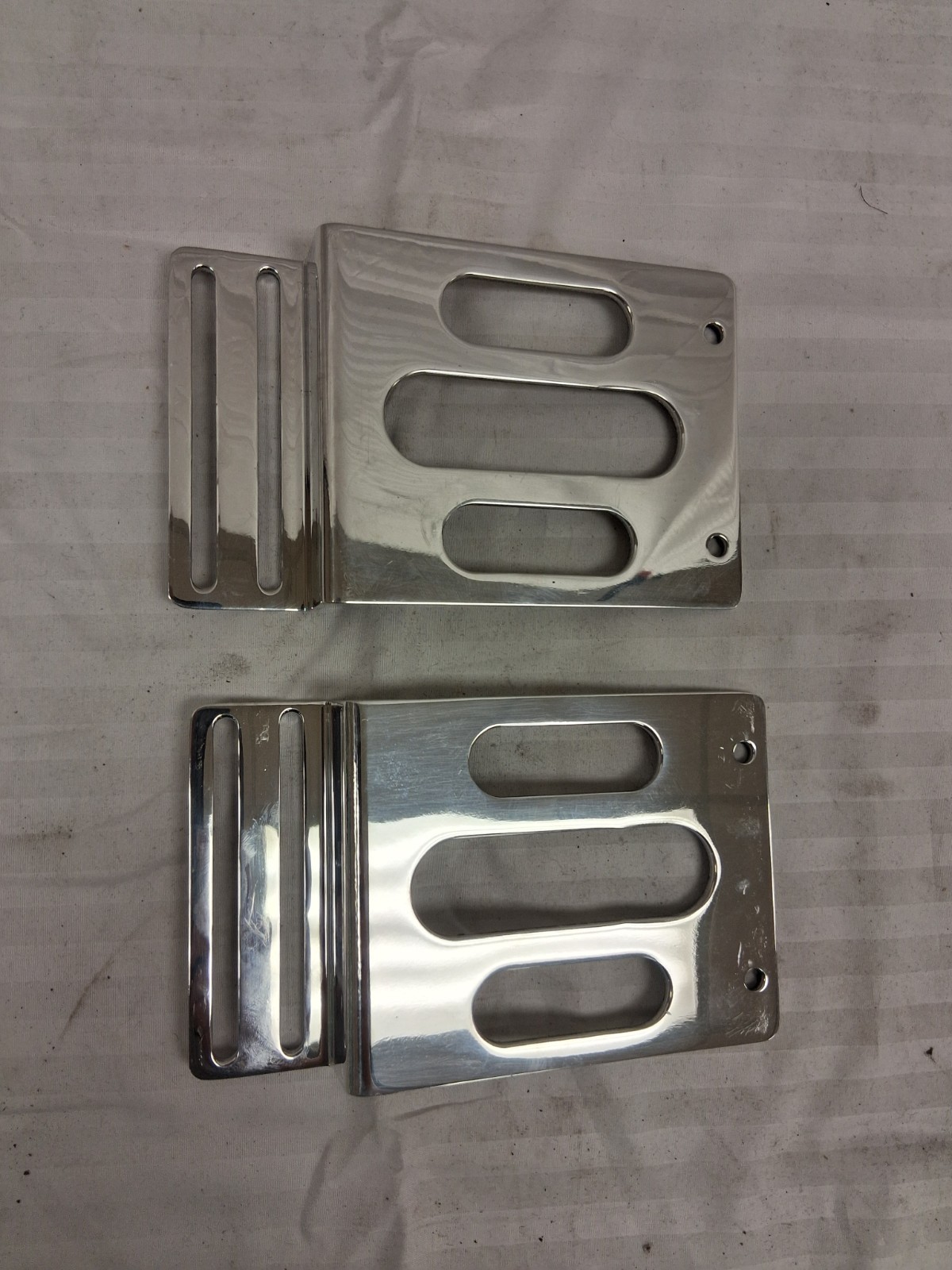 Misc. polished aluminum brackets