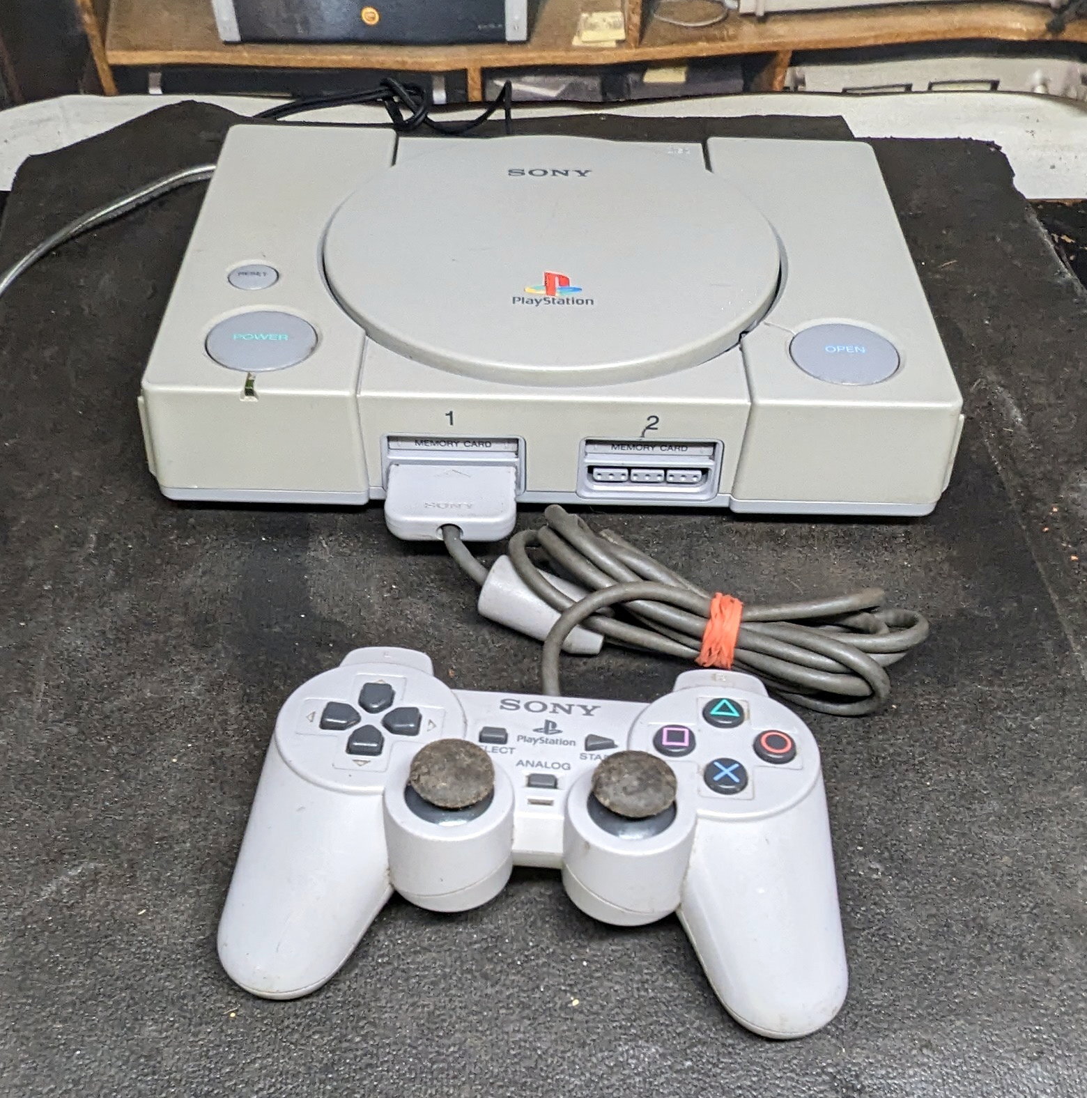 Sony Playstation SCPH-5501 with controller setup for audiophile CD player use.