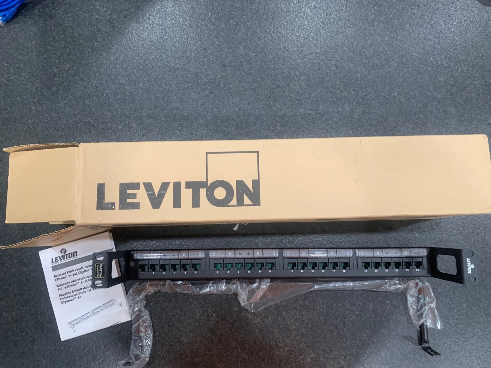 Cat 5e Universal Recessed Patch Panel, 24 Port, 1RU, Black W/ Cable Mgt. bar.