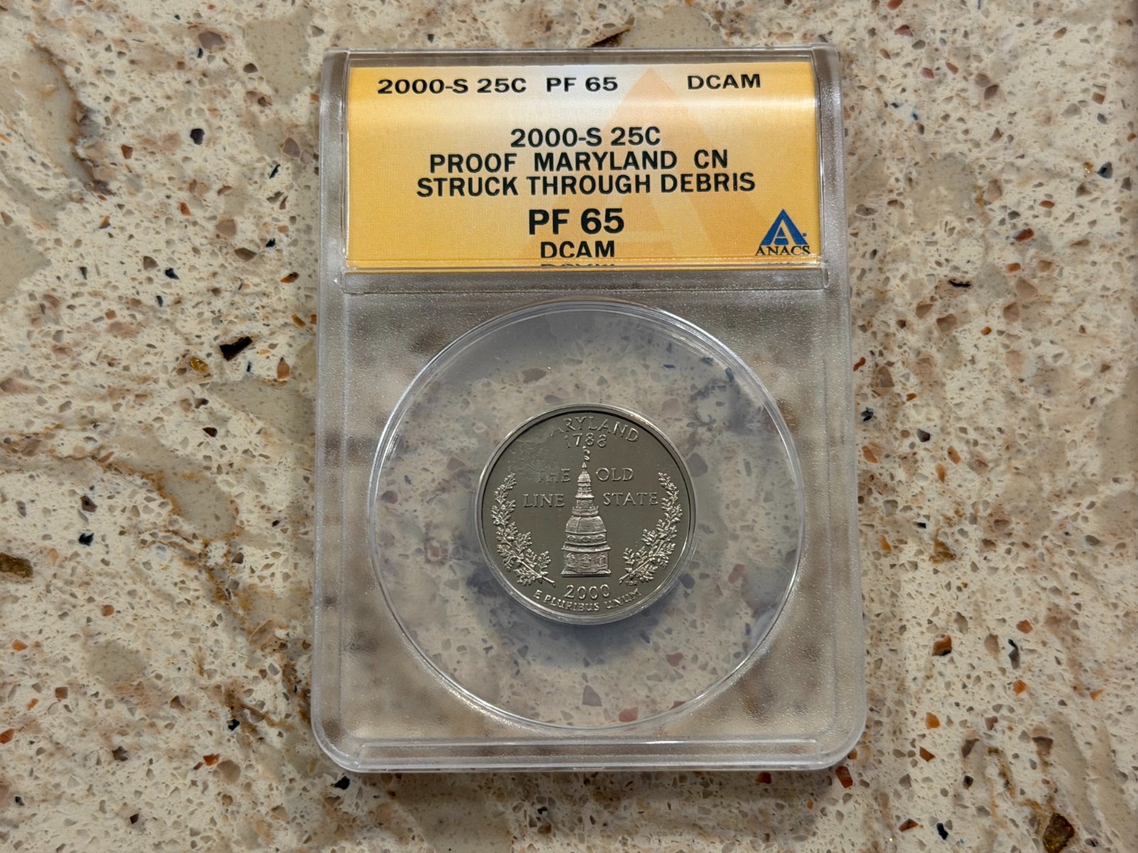 2000-S 25C PF 65 Proof Maryland CN Struck Through Debris DCAM ANACS