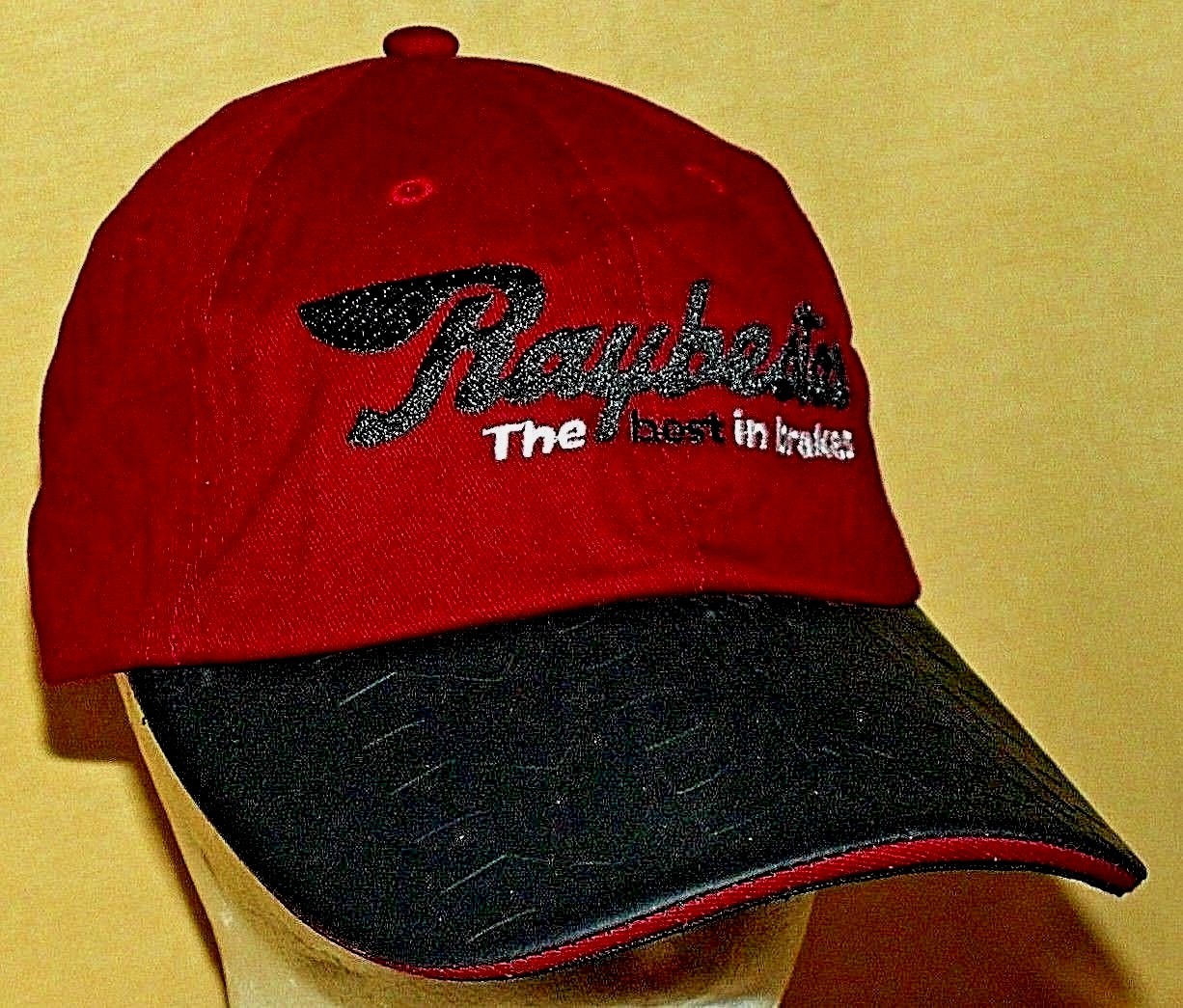 RAYBESTOS HAT BASEBALL BALL CAP BRAKES RUBBER VISOR NORWOOD ADJUSTBLE RED BLACK.