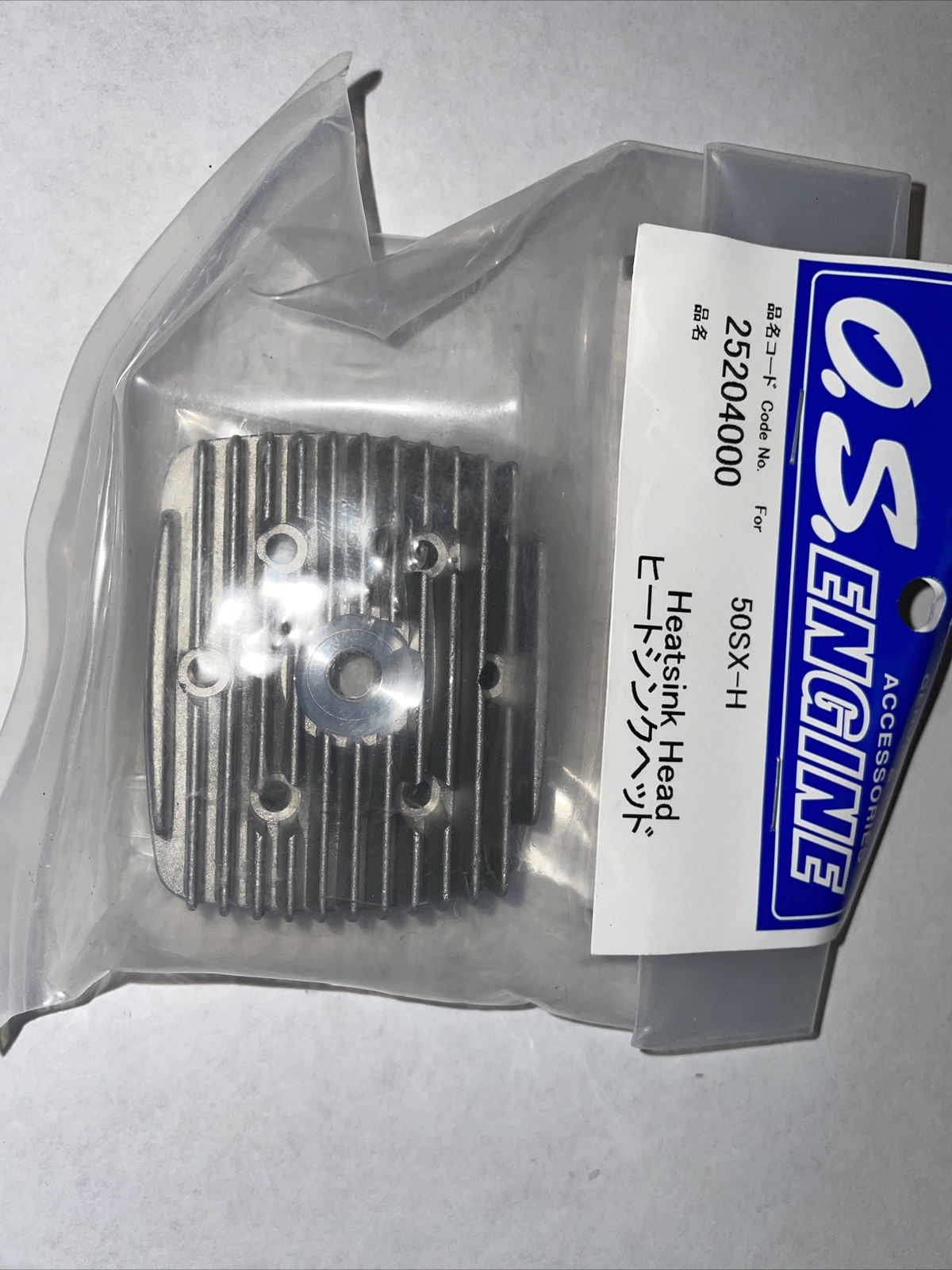 OS 50 SX HELI HEAD NIP