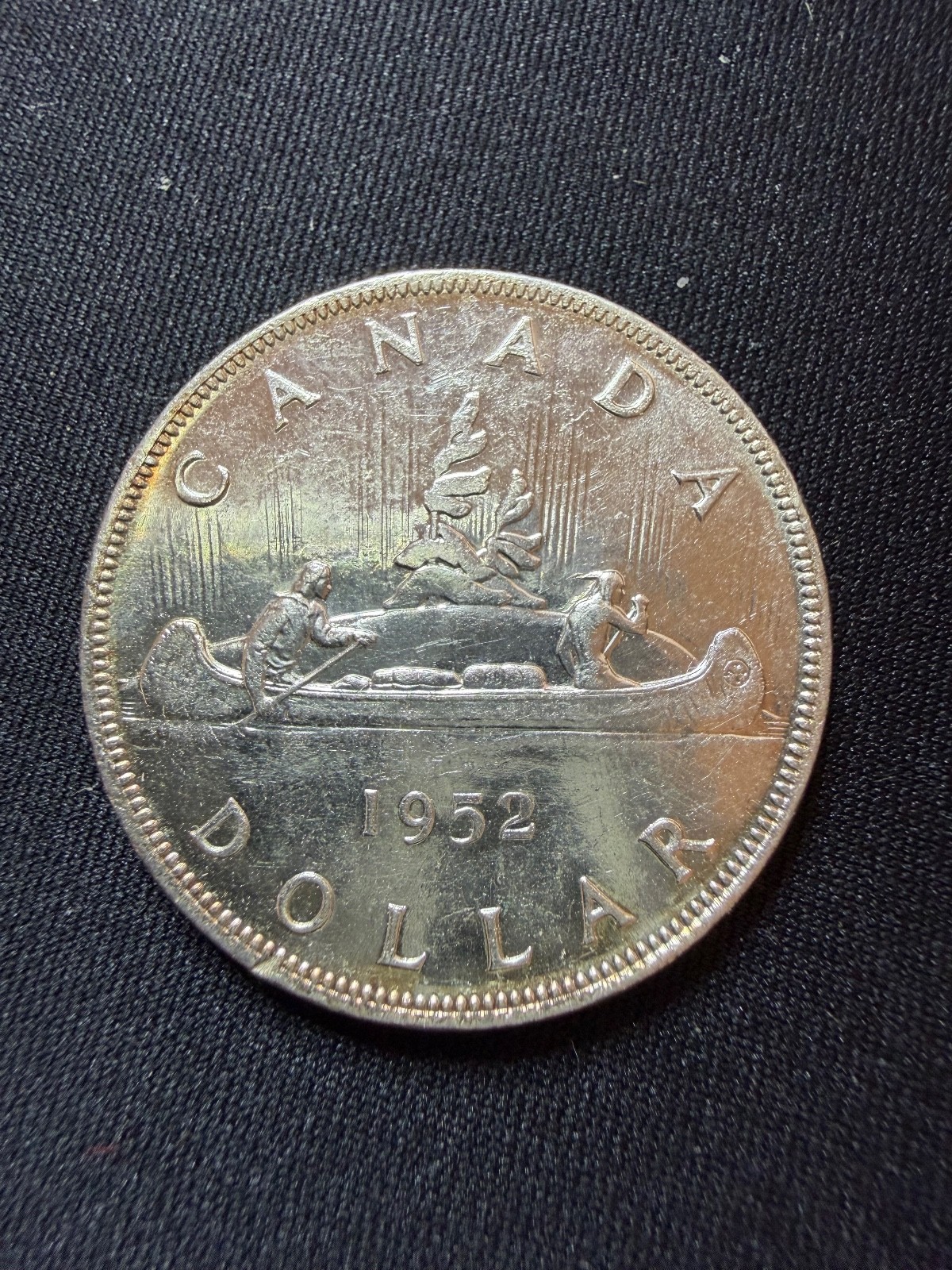 1952 mint Canadian Silver Dollar Coin