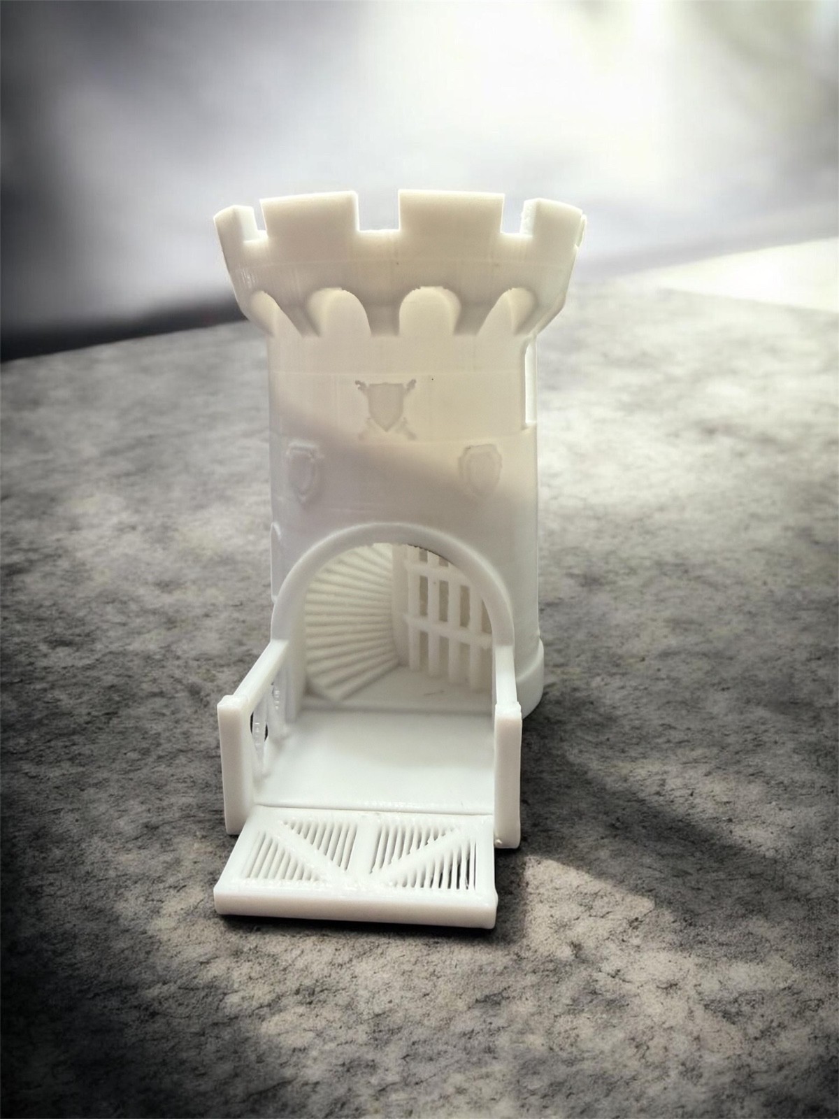 white dice tower with folding gate