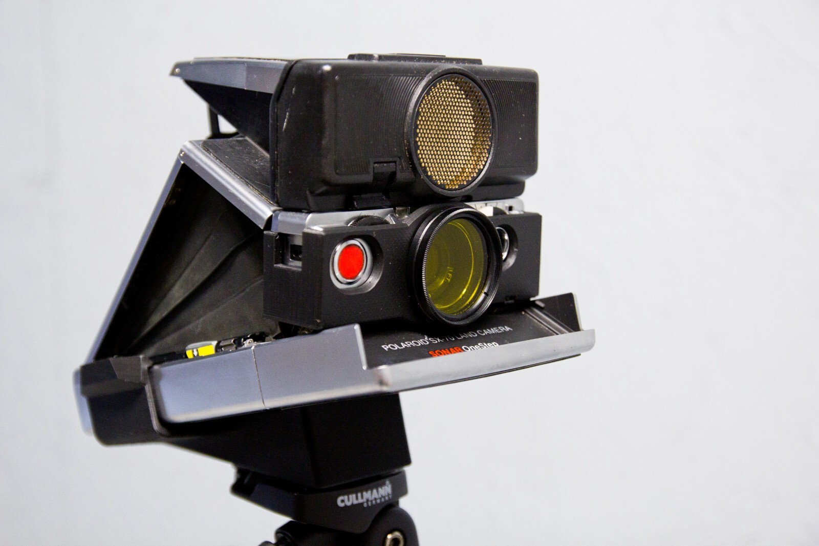Tripod mount for Polaroid SX-70 Instant camera