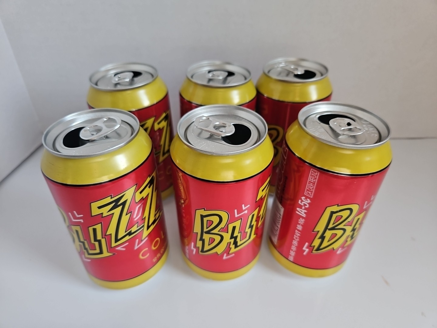 Simpsons Buzz Cola  Six Empty Cans