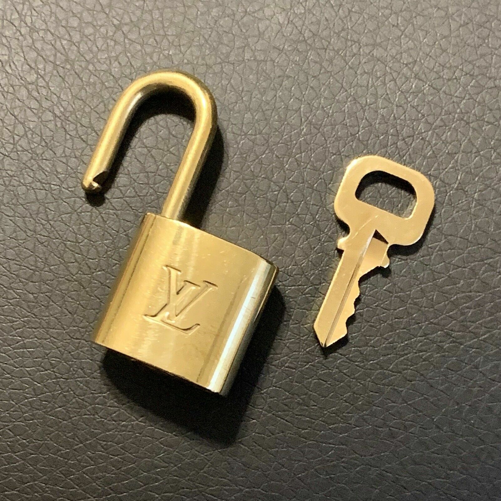 Authentic LOUIS VUITTON Brass Padlock with Matching Key (LV Lock Number Varies)