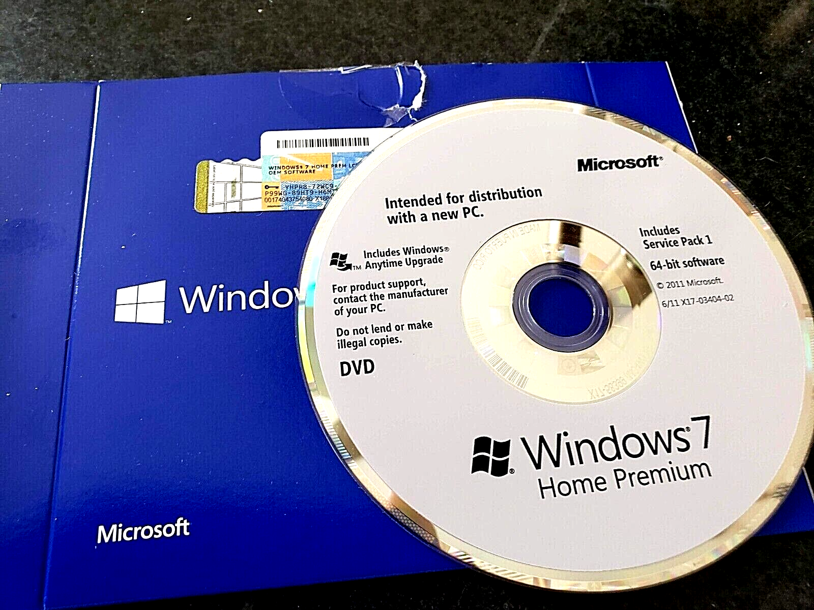 Assorted Software CDs & Logitech Manual (Windows 7, Word Perfect & Linksys)
