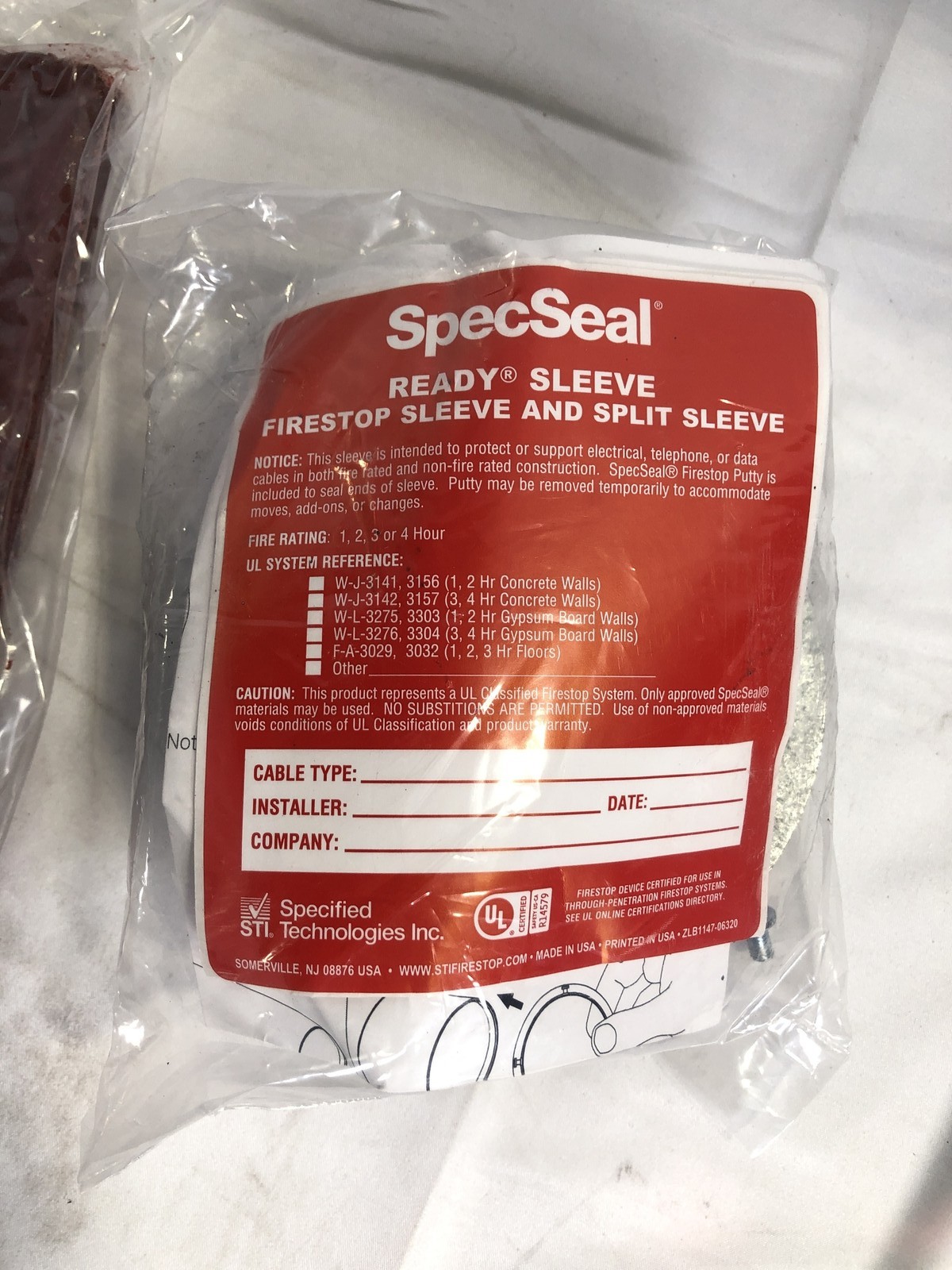 SpecSeal FS201 Ready Sleeve 2" Firestop Split Sleeve w/ Large Escutcheon Plates
