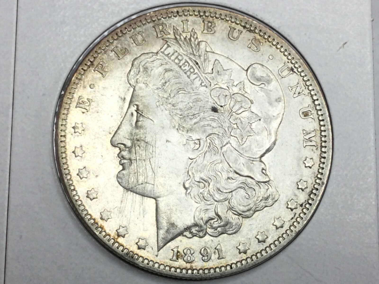 1891-O Morgan Dollar in almost uncirculated nice