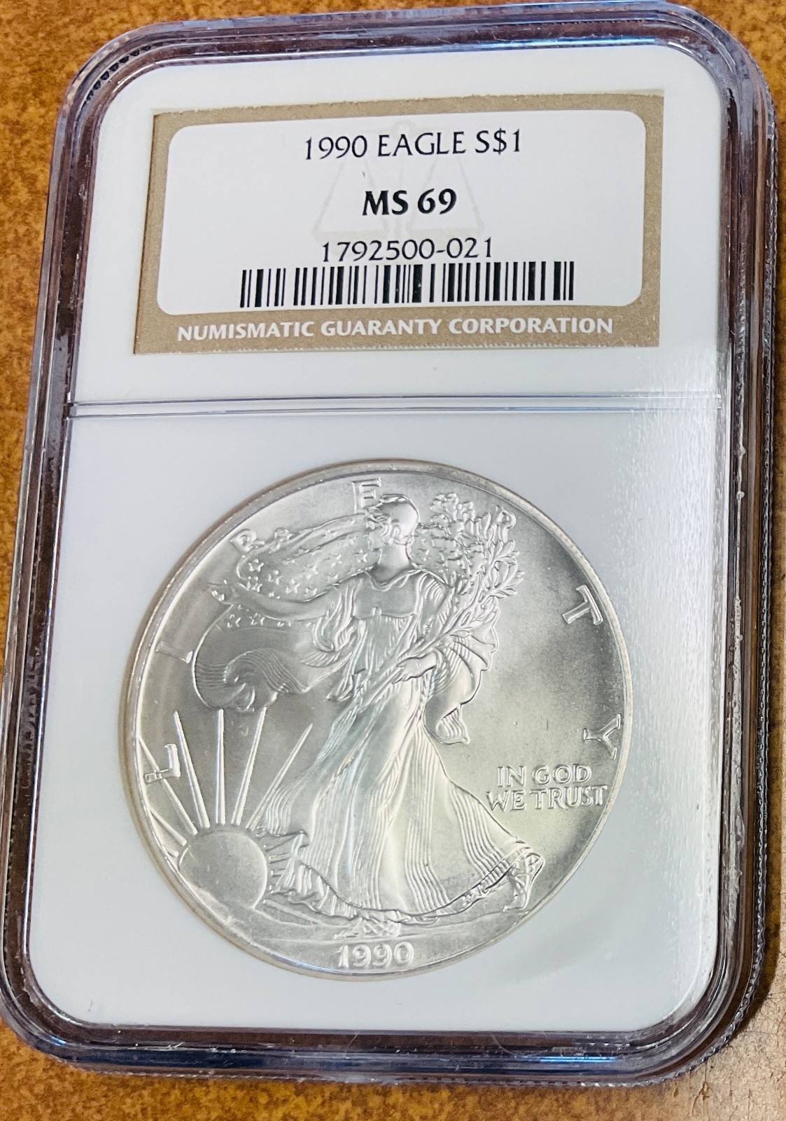 1990 $1 AMERICAN SILVER EAGLE NGC MS69  nice BU coin. Brown Label.