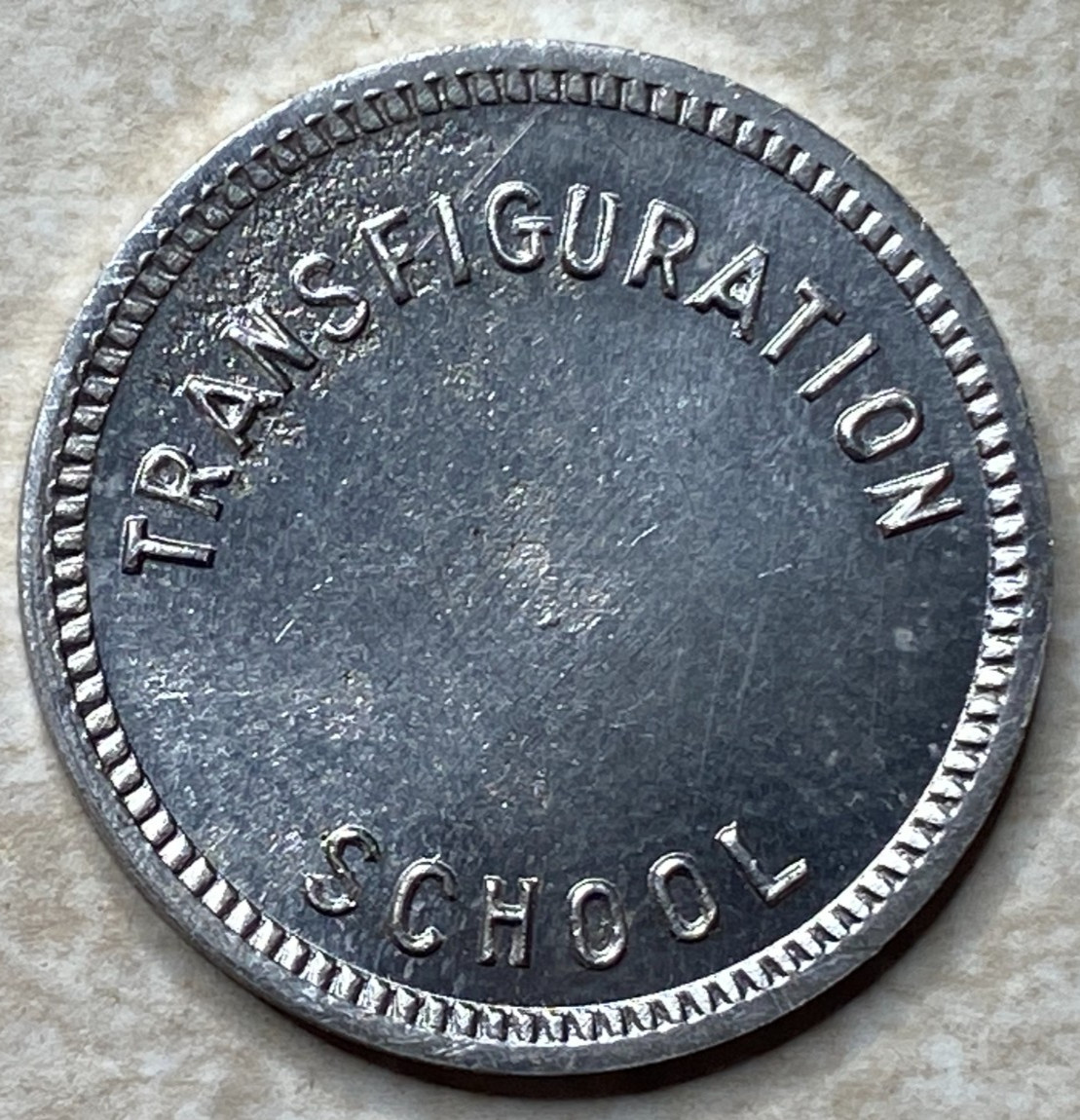 T9149 Transfiguration School, Los Angeles, CA  Anillo Restrike Arcade Token