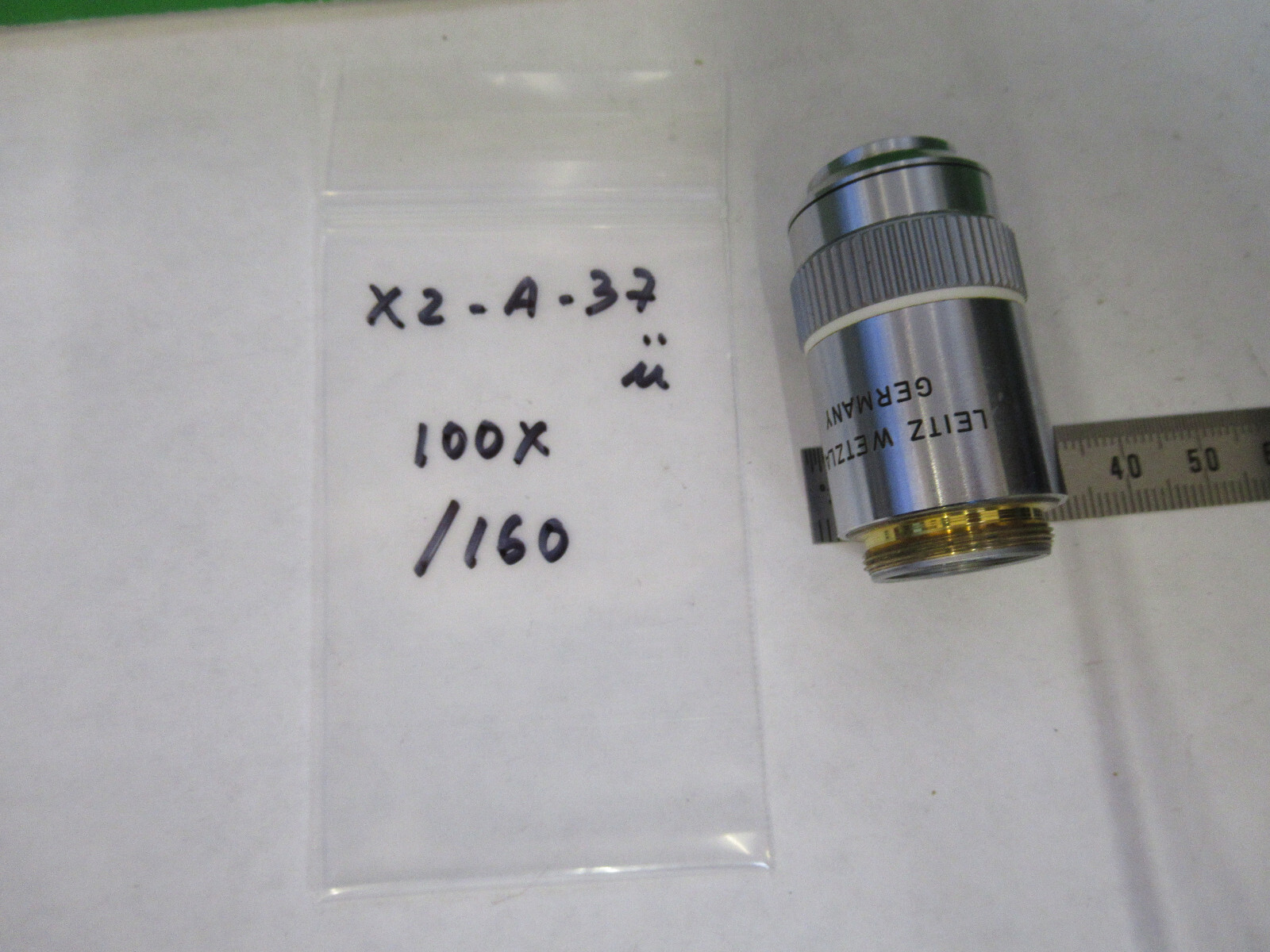 LEITZ wetzlar GERMANY OBJECTIVE MICROSCOPE PART 100X /160 AS PICTURED X2-A-37