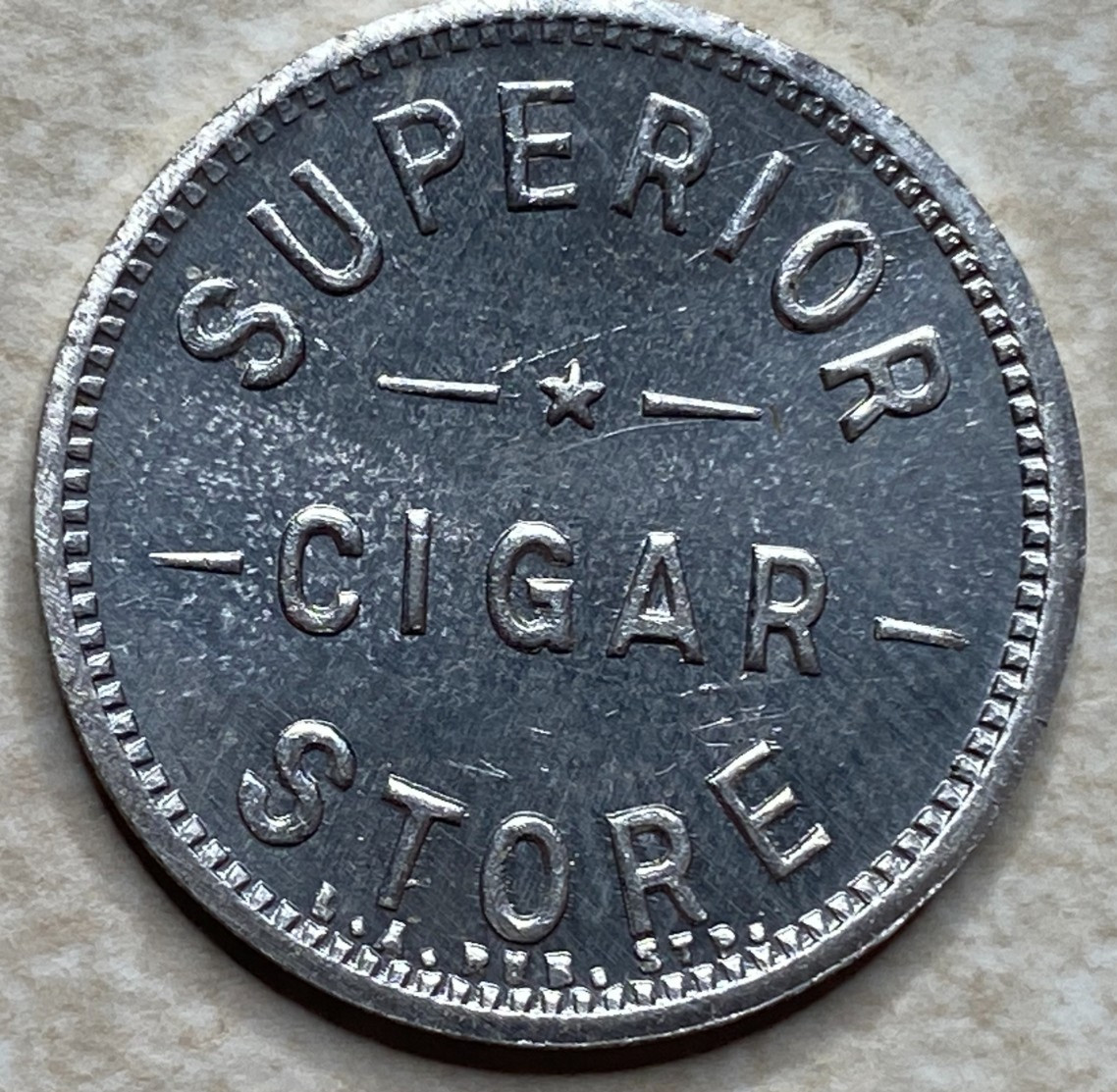 T9298 Superior Cigar Store, Los Angeles, CA  Anillo Restrike Arcade Token