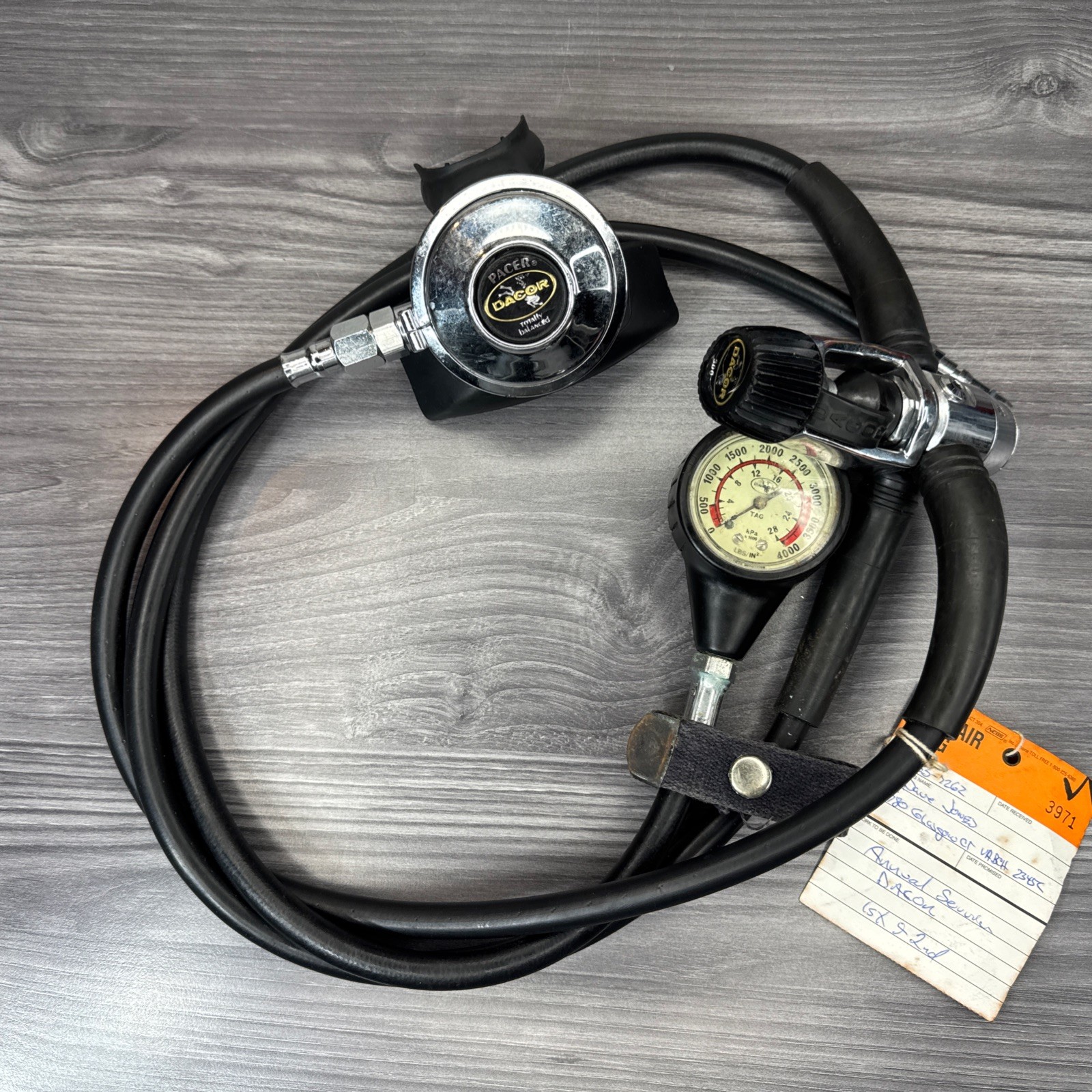DACOR DIVING EQUIPMENT- REGULATOR PRESSURE GAUGE PACER MOUTH PIECE - SERVICE TAG