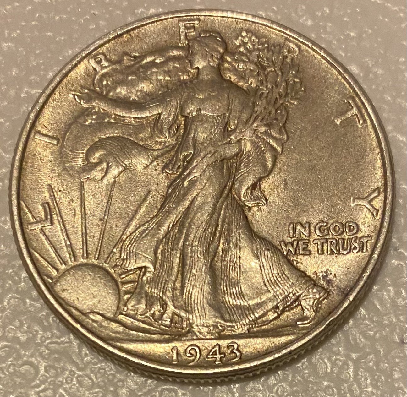 1943 Walking Liberty Half Dollar In AU Condition
