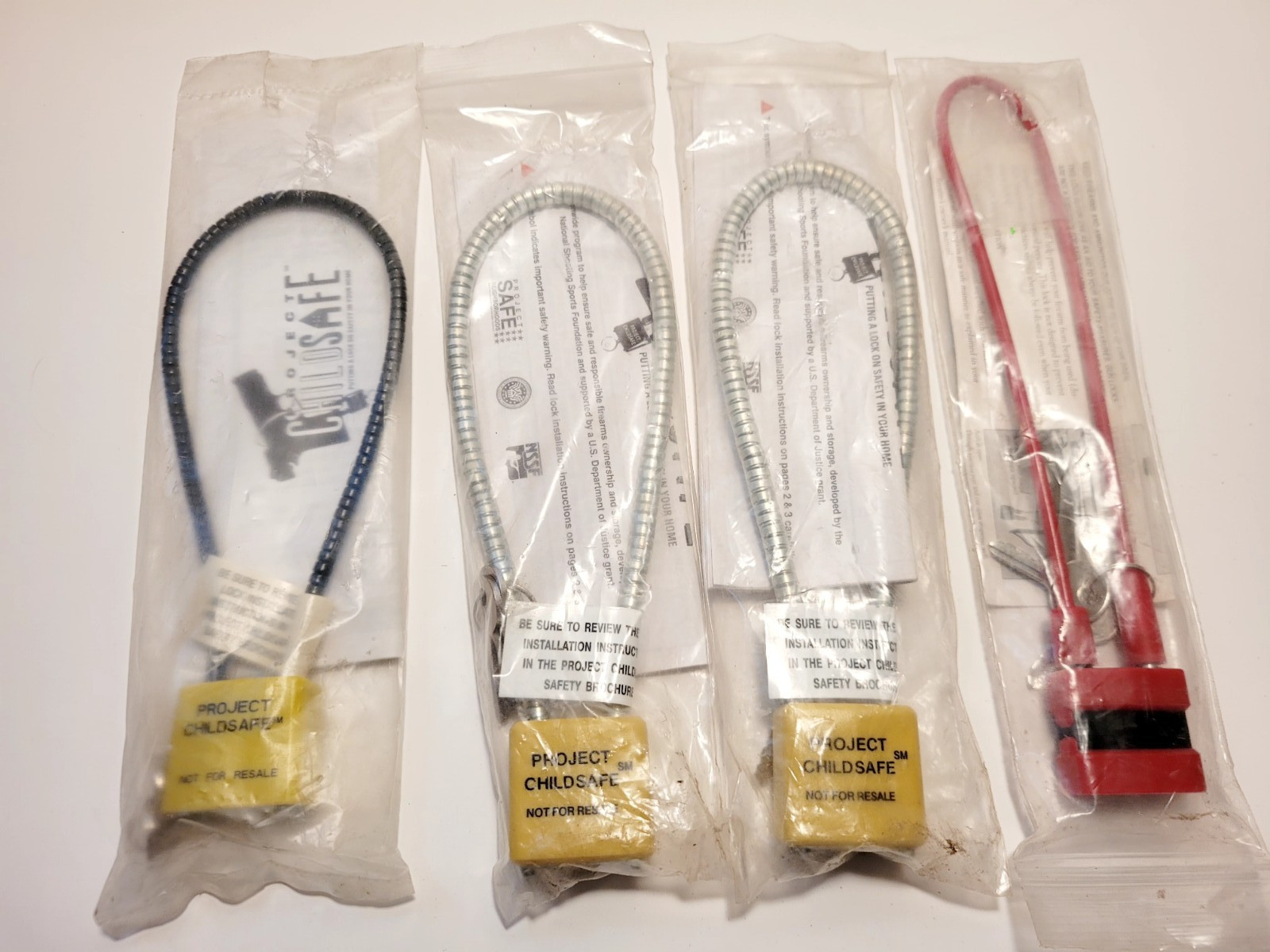 Project Childsafe Gun Lock Bundle w/ Keys   Silver Cable Style Lot of 4