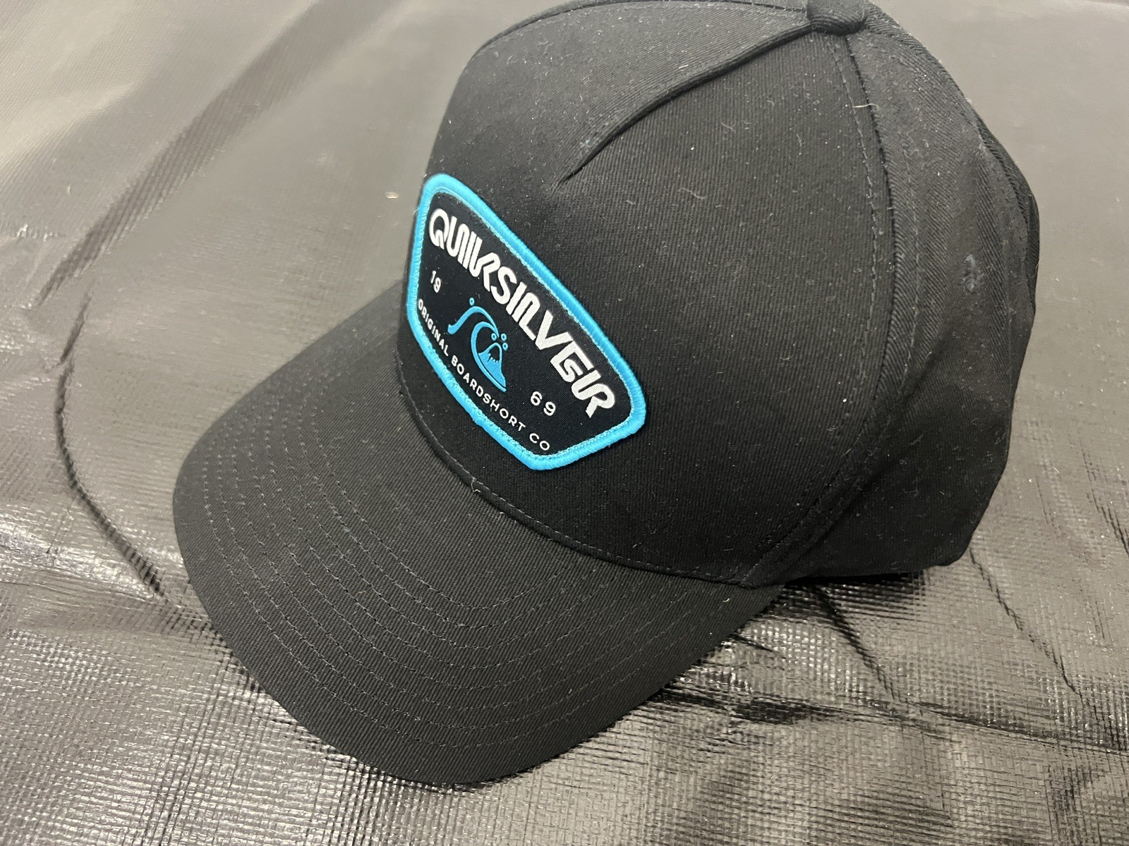 QUIKSILVER Black Trapazoid Teal Patch Logo Solid Hat Cap Snapback Curve Brim NEW