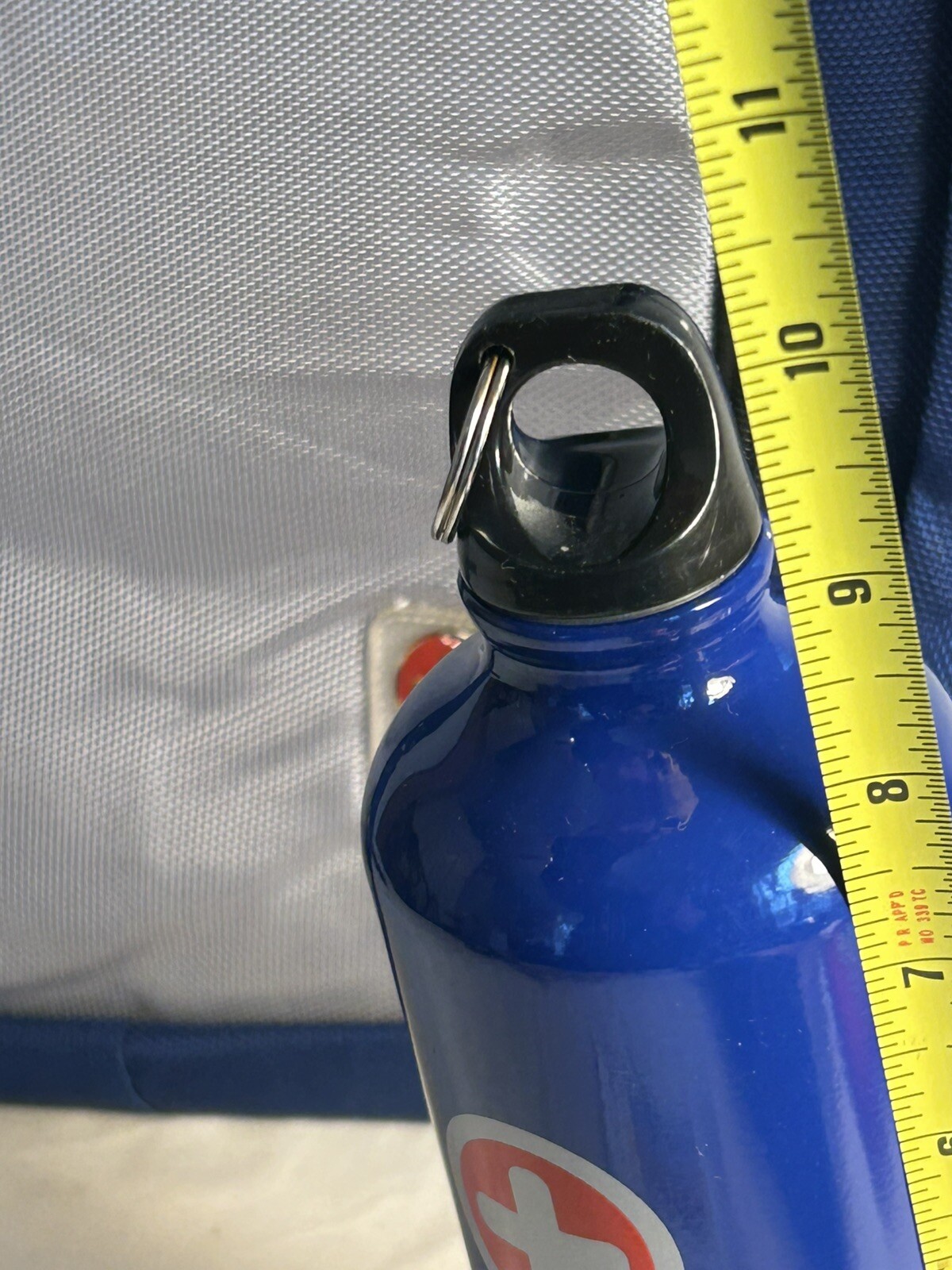Blue/Grey NGG Swiss Edition Backpack with blue water bottle computer school
