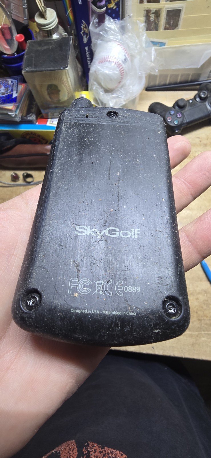 black SkyCaddie SGX handheld golf GPS rangefinder
