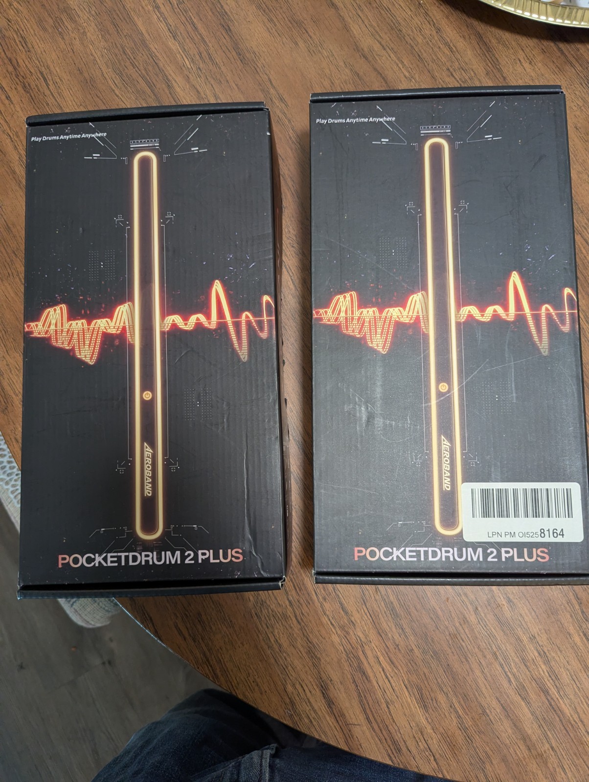 Two AeroBand Pocket Drum 2 Plus Electric Air Drum Set Wood