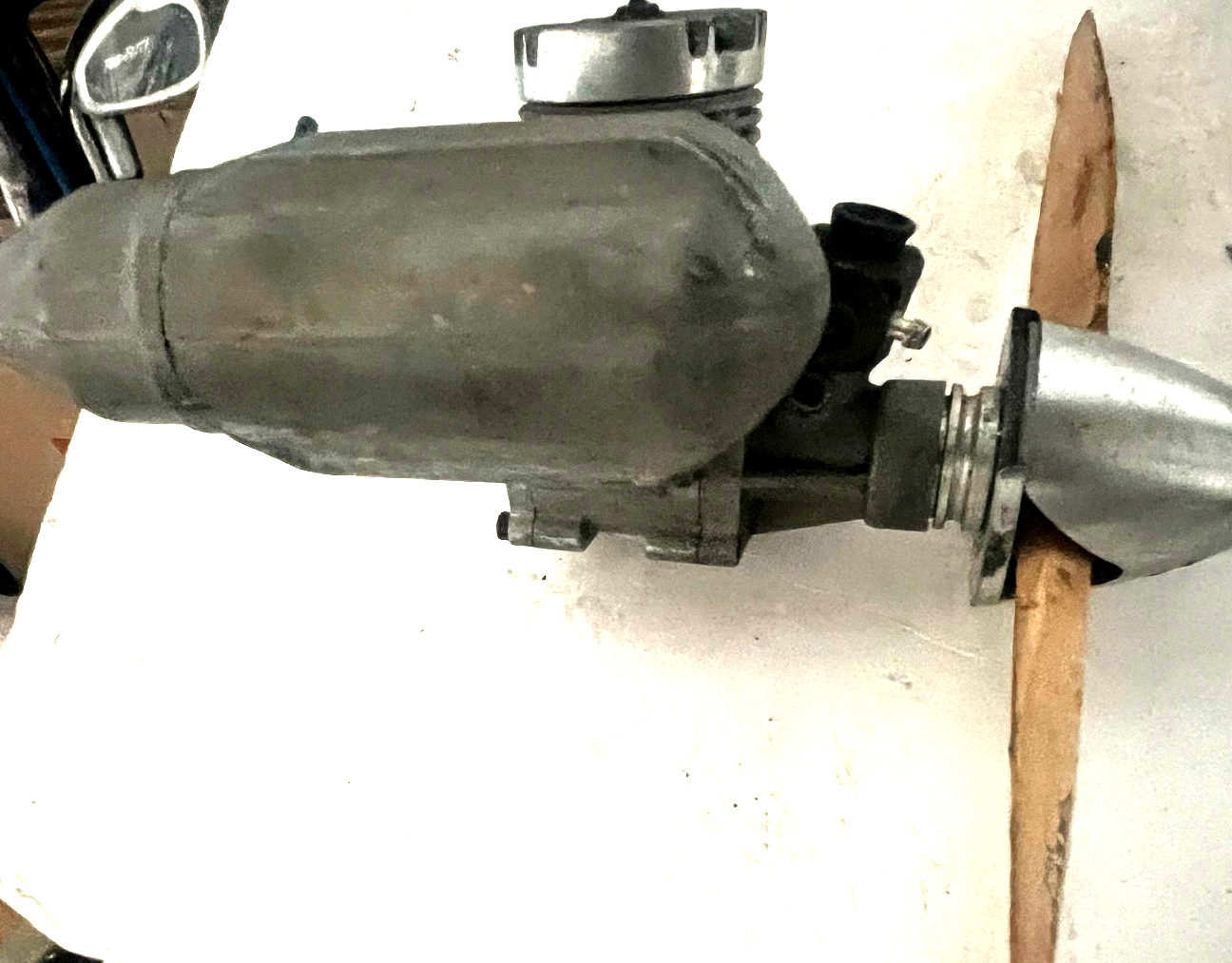 nitro airplane engine with propeller nose have a few scratches