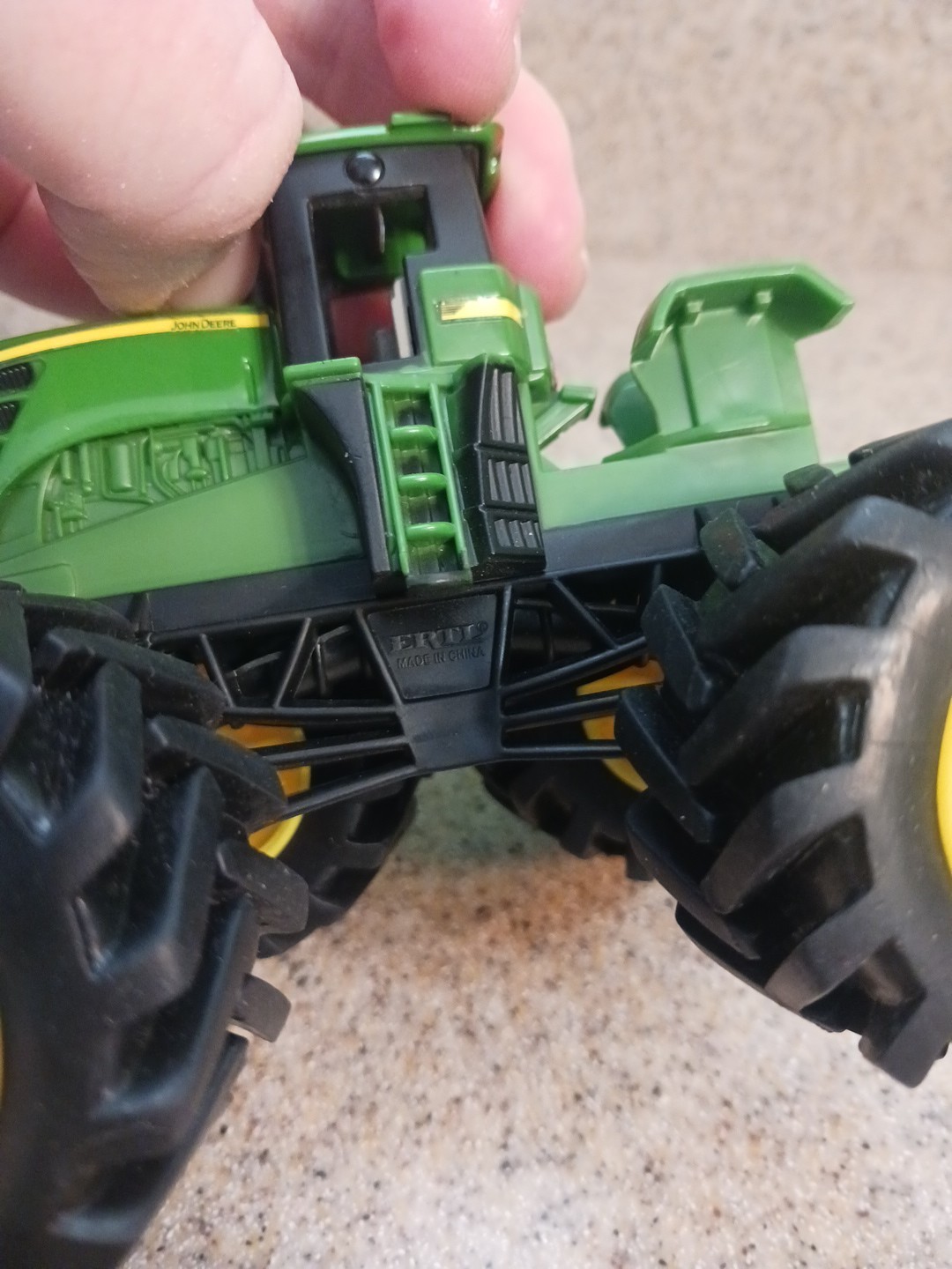 Ertl John Deere Plastic Tractor in picture John Deere licensed