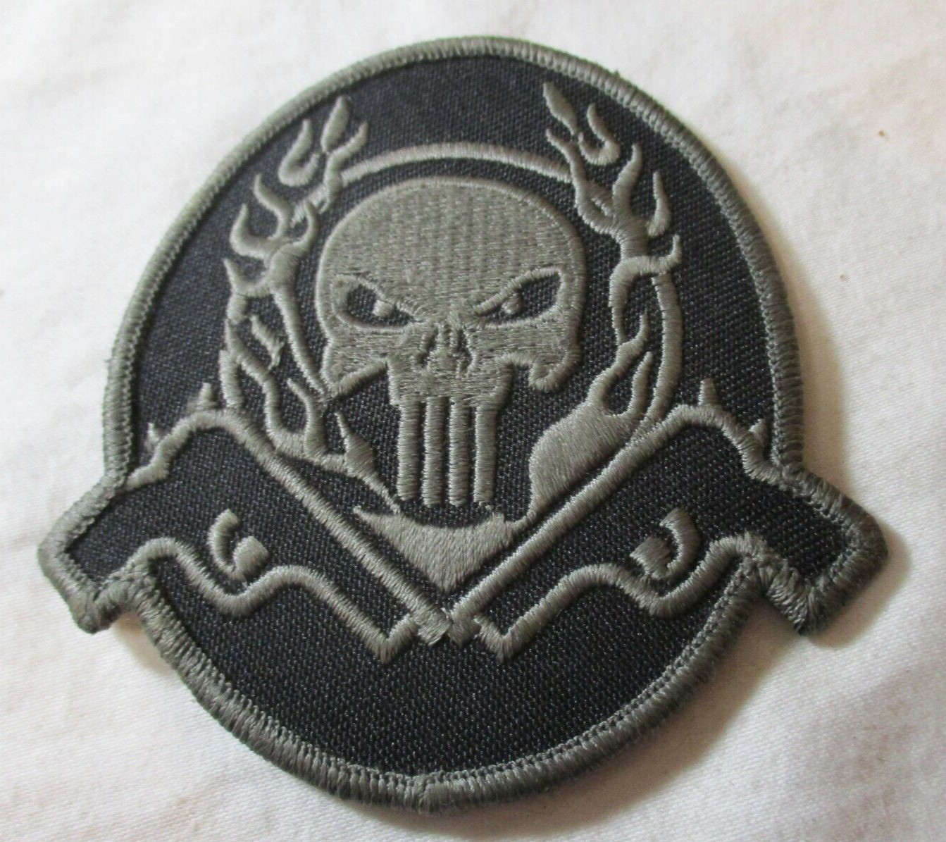 US Military Punisher Skull and Pistols Self Attaching Patch / Special Warfare