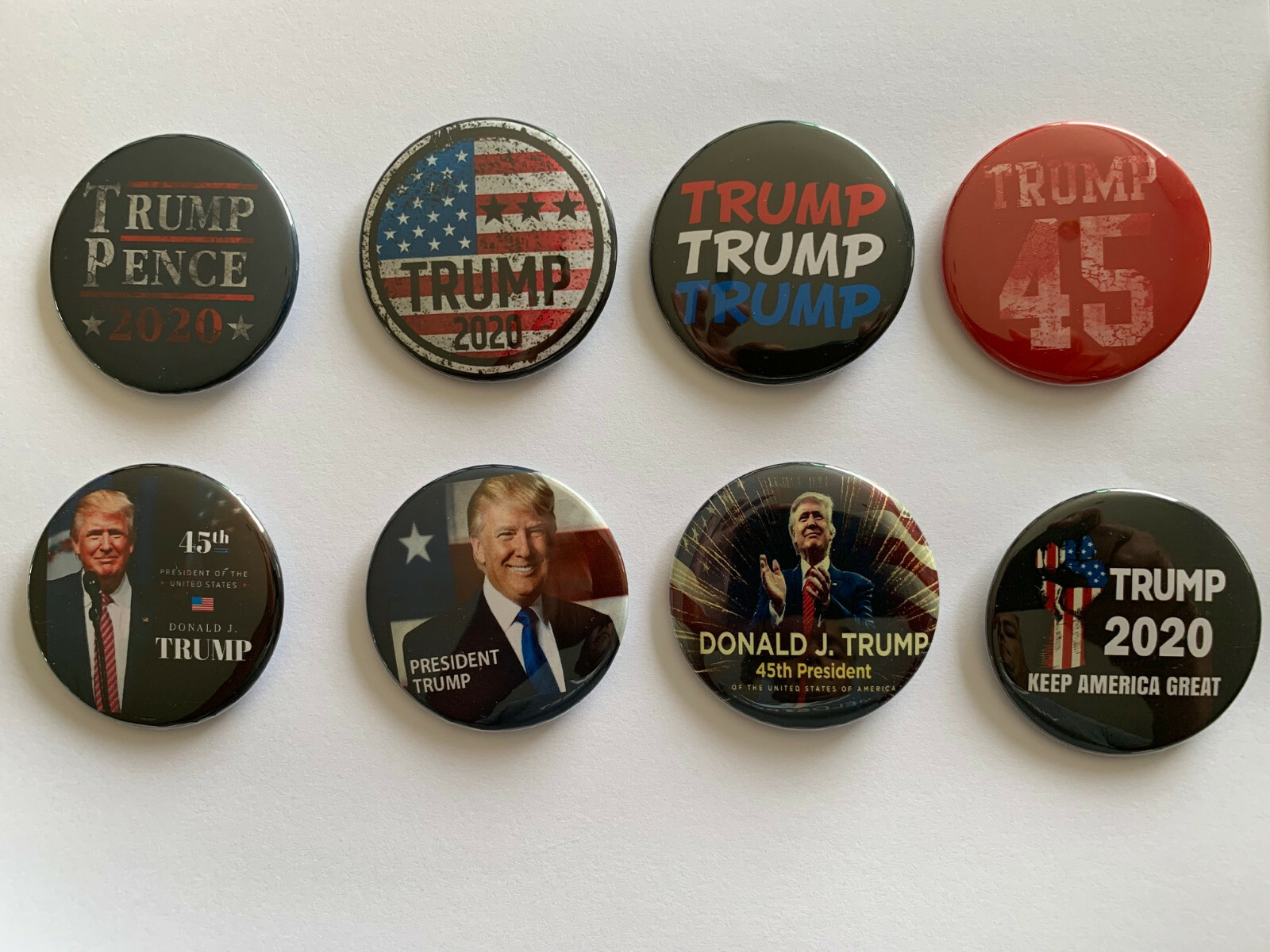 Trump 45 – Collectible Set of 8 Donald Trump pinback buttons (2.25 inches)
