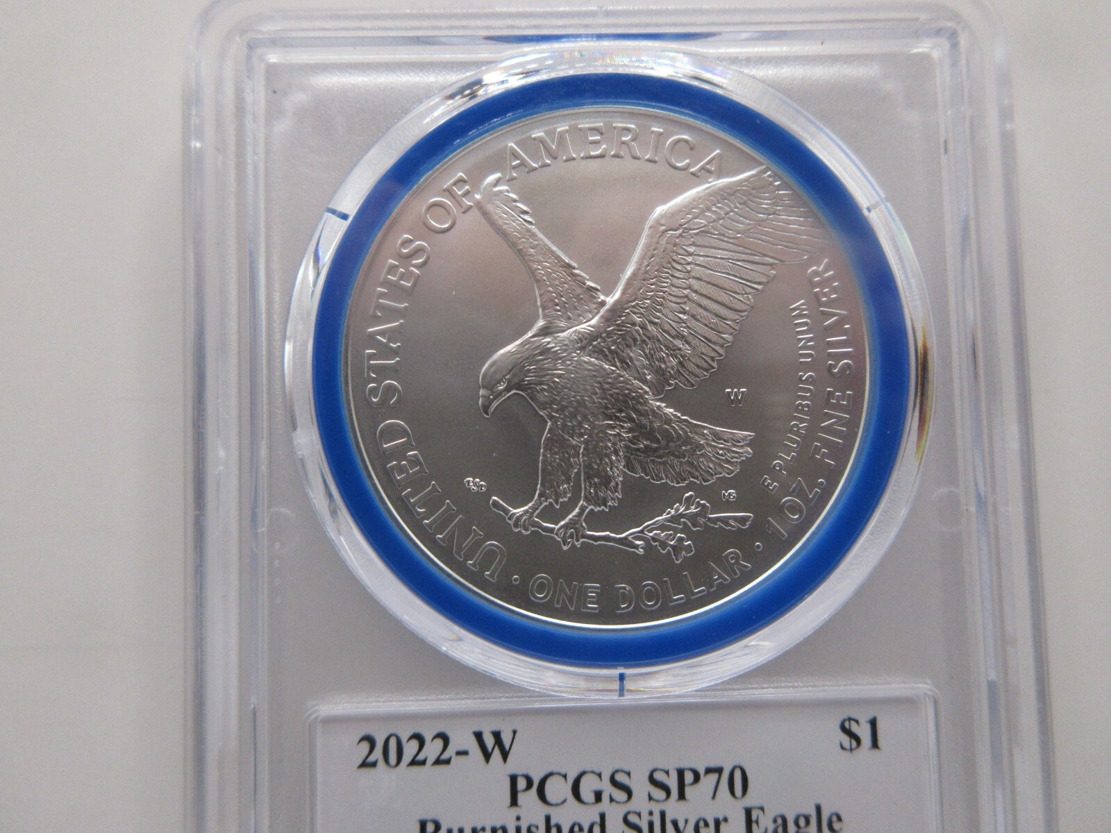 2022-W Burnished Silver Eagle Advanced Release; Mint Designer Damstra PCGS SP70