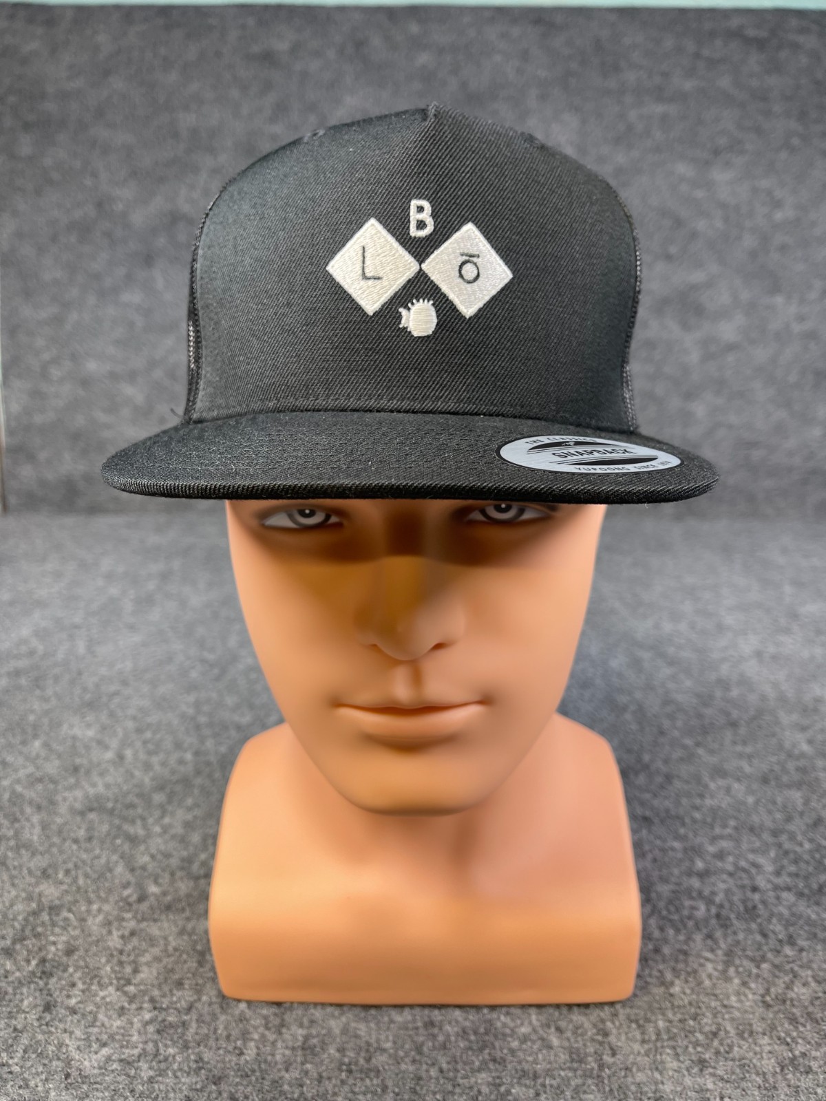 BLōFISH Branded and Logoed Cap Black Trucker mesh snap back closure