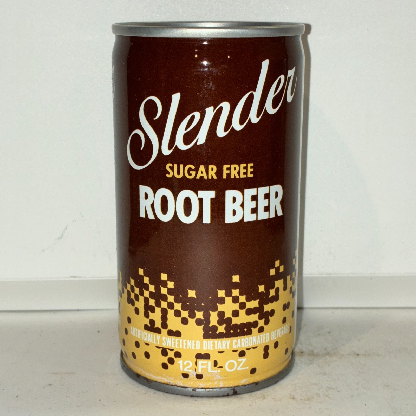 Slender sugar free root beer soda can, bottom opened