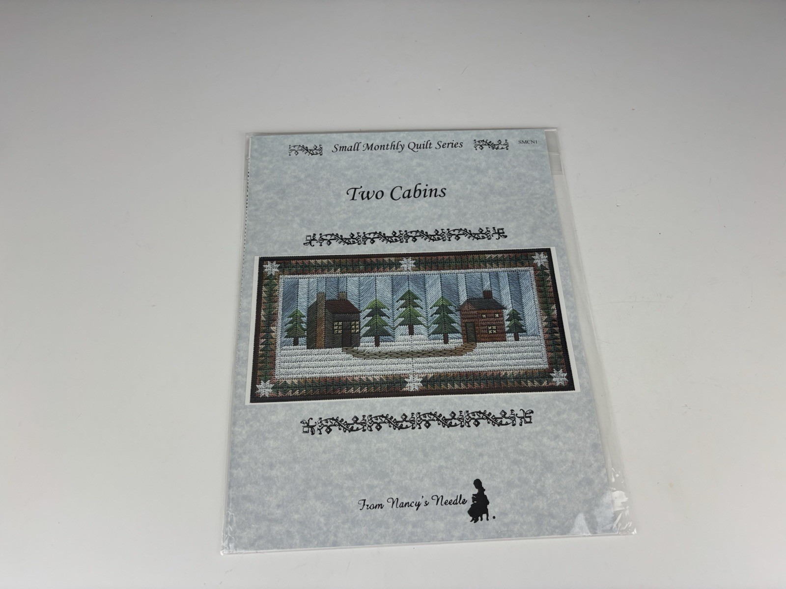 From Nancy’s Needle Monthly Quilt Series Two Cabins Needlepoint Pattern 1S