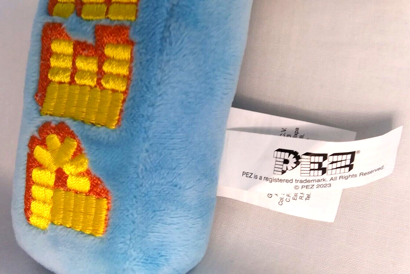 PEZ Chick Easter Plush 7 '' Tall 2'' Thick Yellow Blue Embroidered Features Ruz