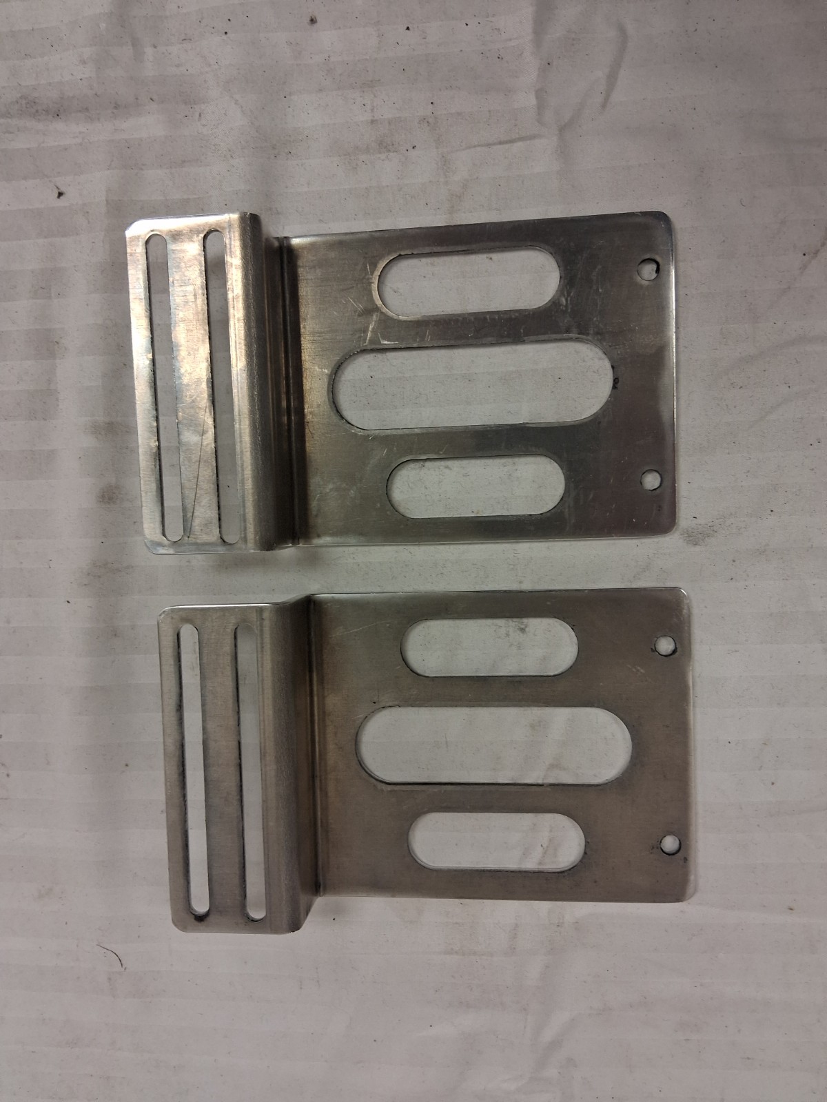 Misc. polished aluminum brackets