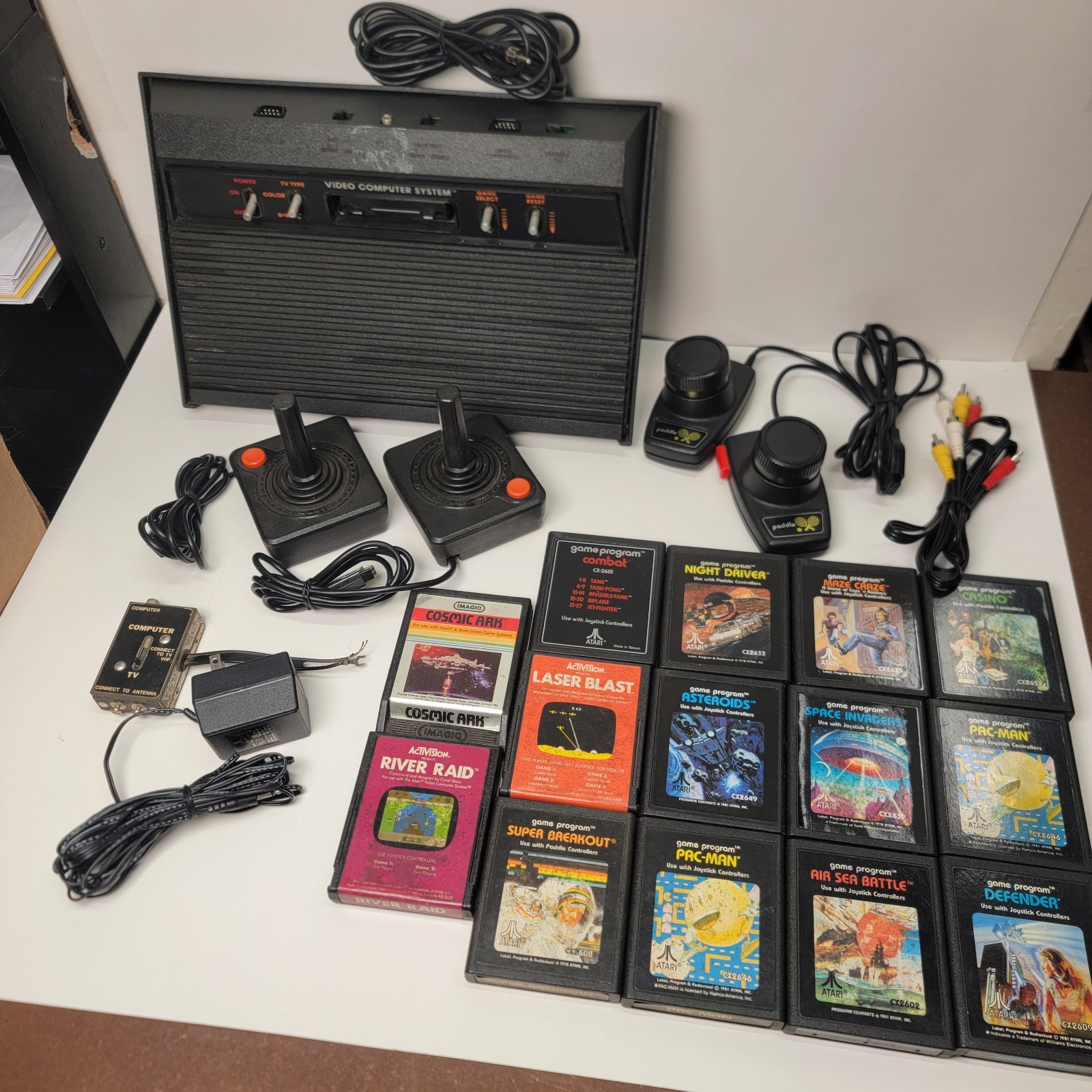 Atari 2600 Console * Controllers * Games ** Large Lot ** Untested