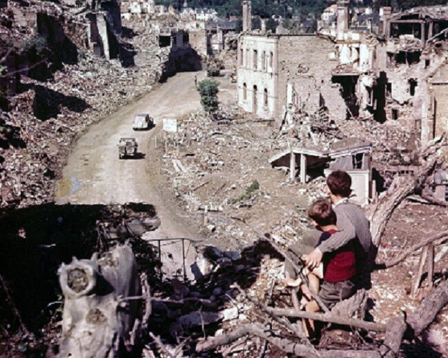 Two French boys watch American troops pass by post D-Day 8x10 WWII Photo 264a