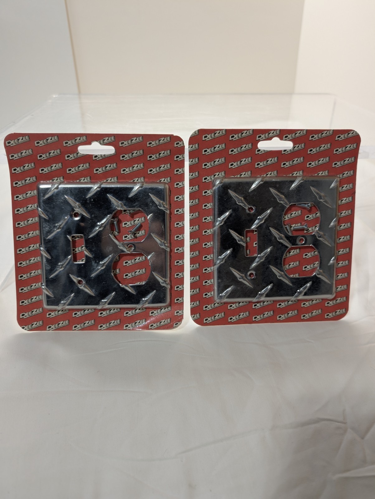 2 PCs DeeZee Brite Tread Outlet Cover. New Unopened Damaged Package