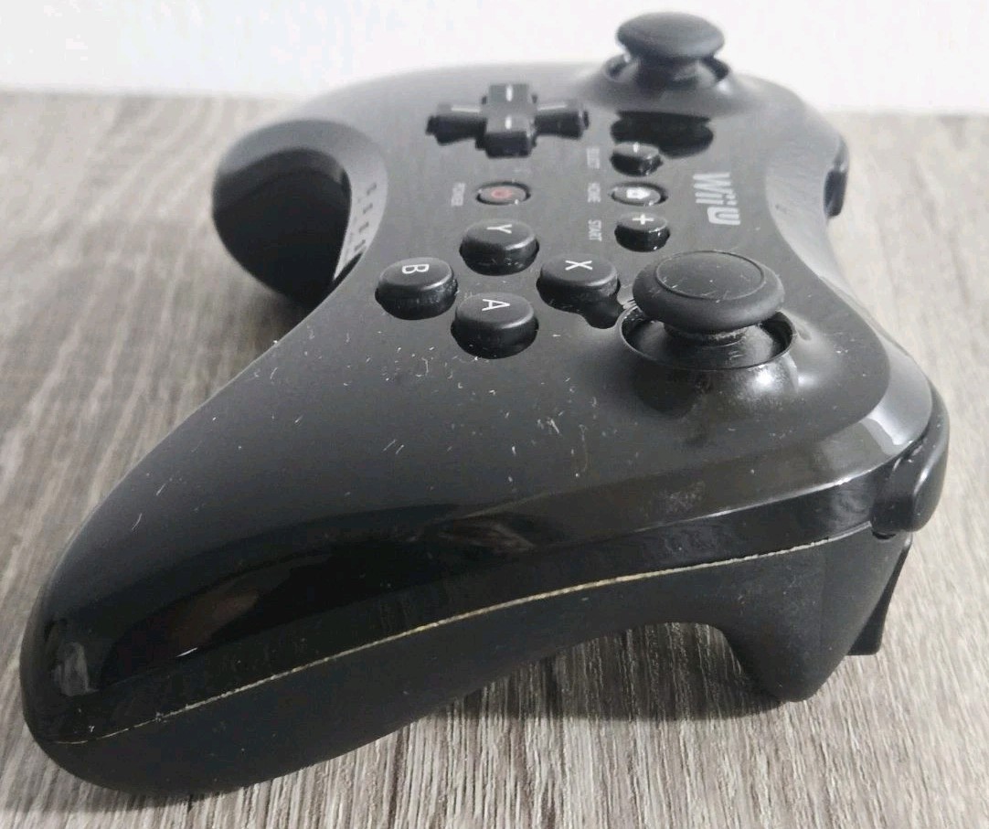 Official OEM Nintendo Wii U Black Wireless Pro Controller Used.