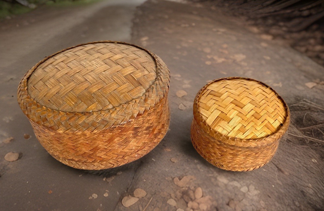 Pair of Vintage Hand Woven Round Bamboo Nesting Baskets with Lids 8" and 5" Wide