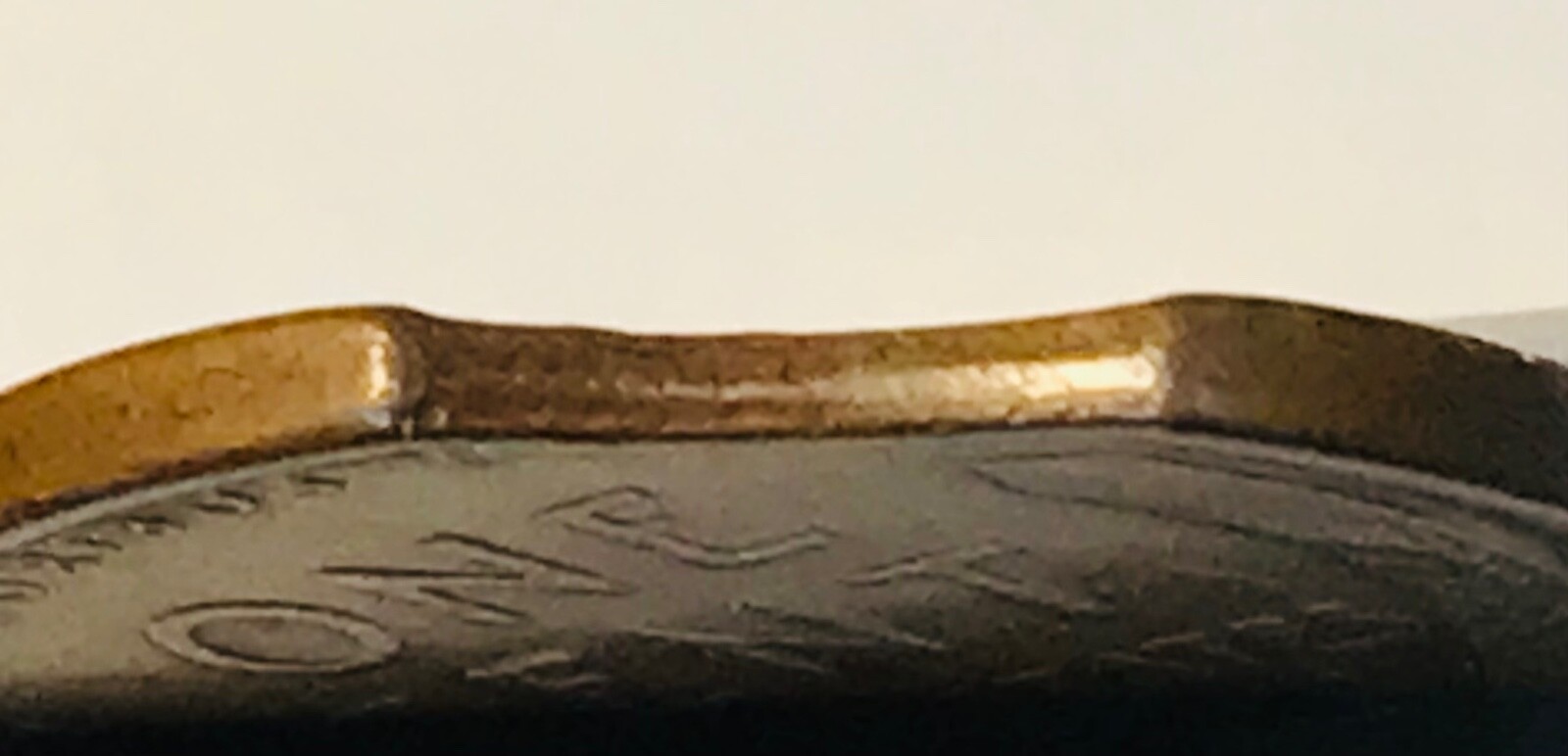 1944 Lincoln Wheat cent with curved clip