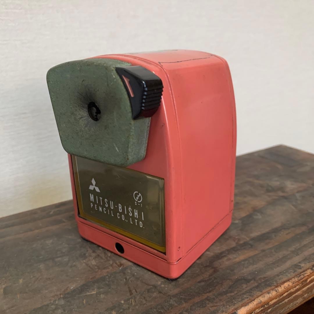 Vintage pink plastic manual pencil sharpener