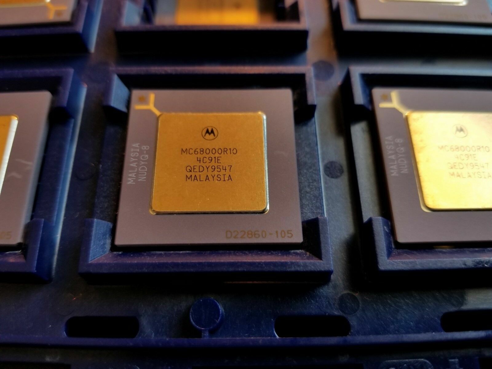 Vintage Motorola MC68000R10 68000 CPU in purple ceramic and gold PGA package