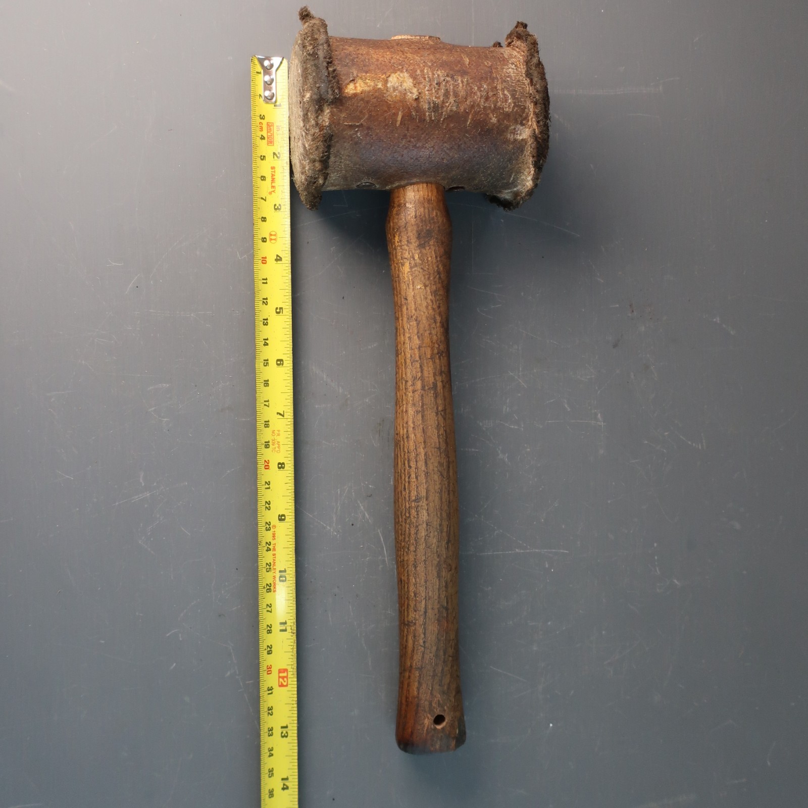 Vintage Rolled Rawhide Mallet with Wooden Handle