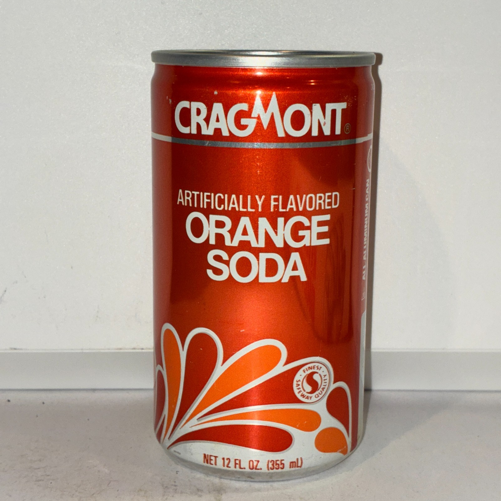 Cragmont (Safeway store brand) Orange soda can, bottom opened, aluminum