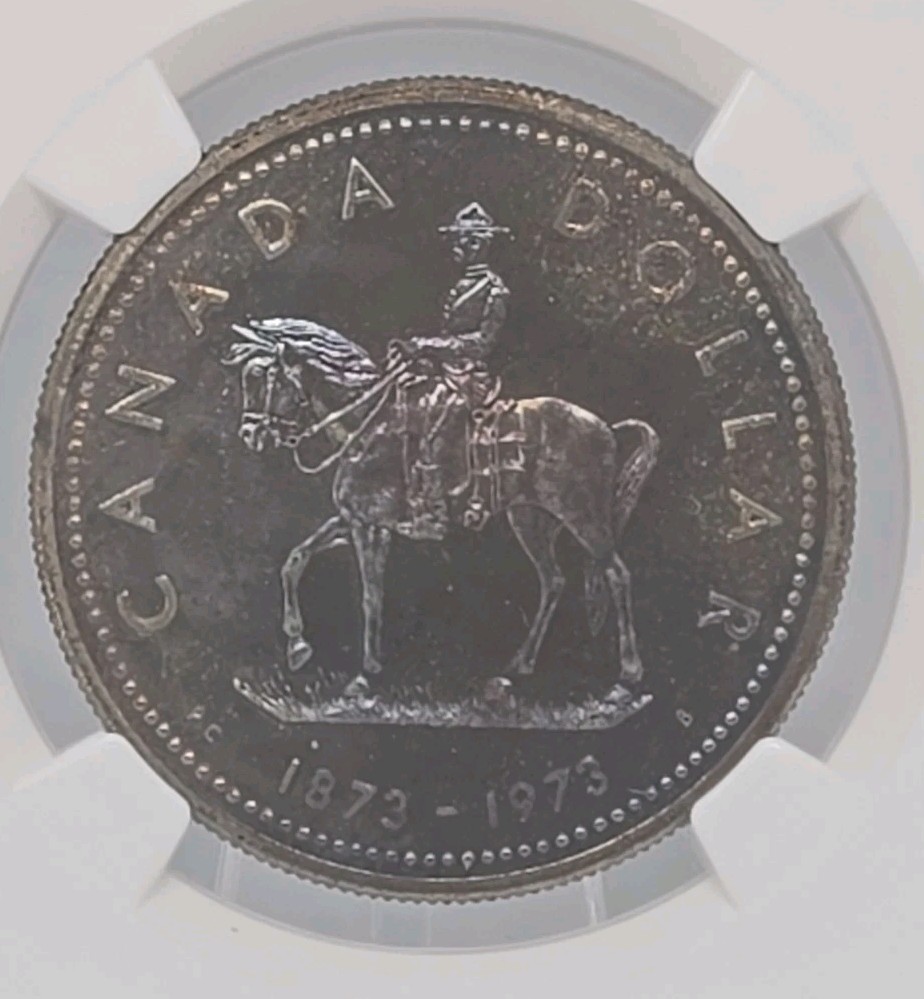 1973 CANADA SILVER $1 RCMP CENTENNIAL NGC SP67 With Toning